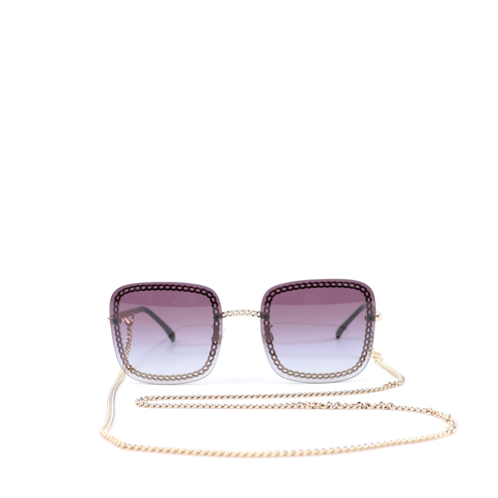CHANEL - Lunettes de soleil avec chaîne