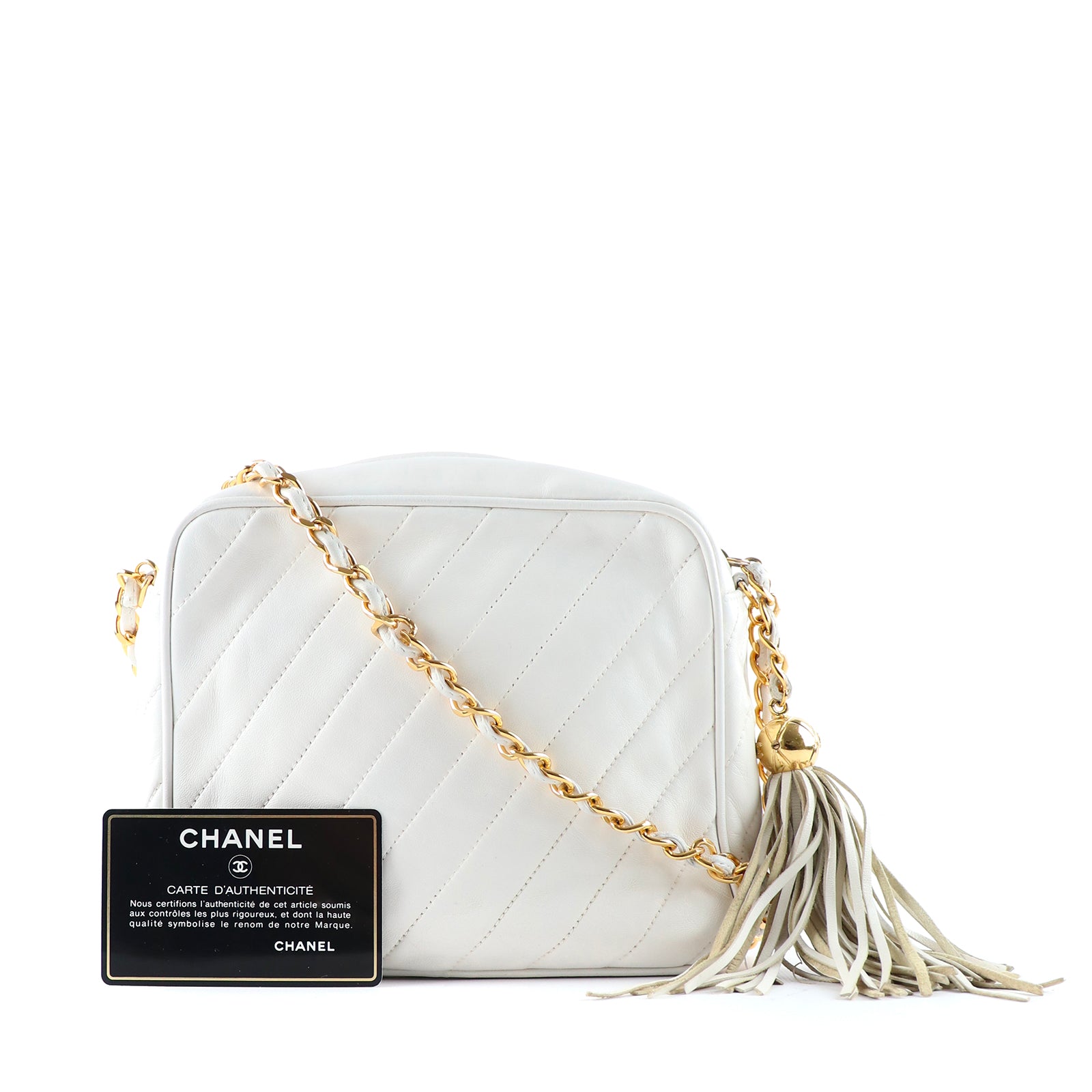 CHANEL - Sac à bandoulière Caméra vintage en cuir blanc