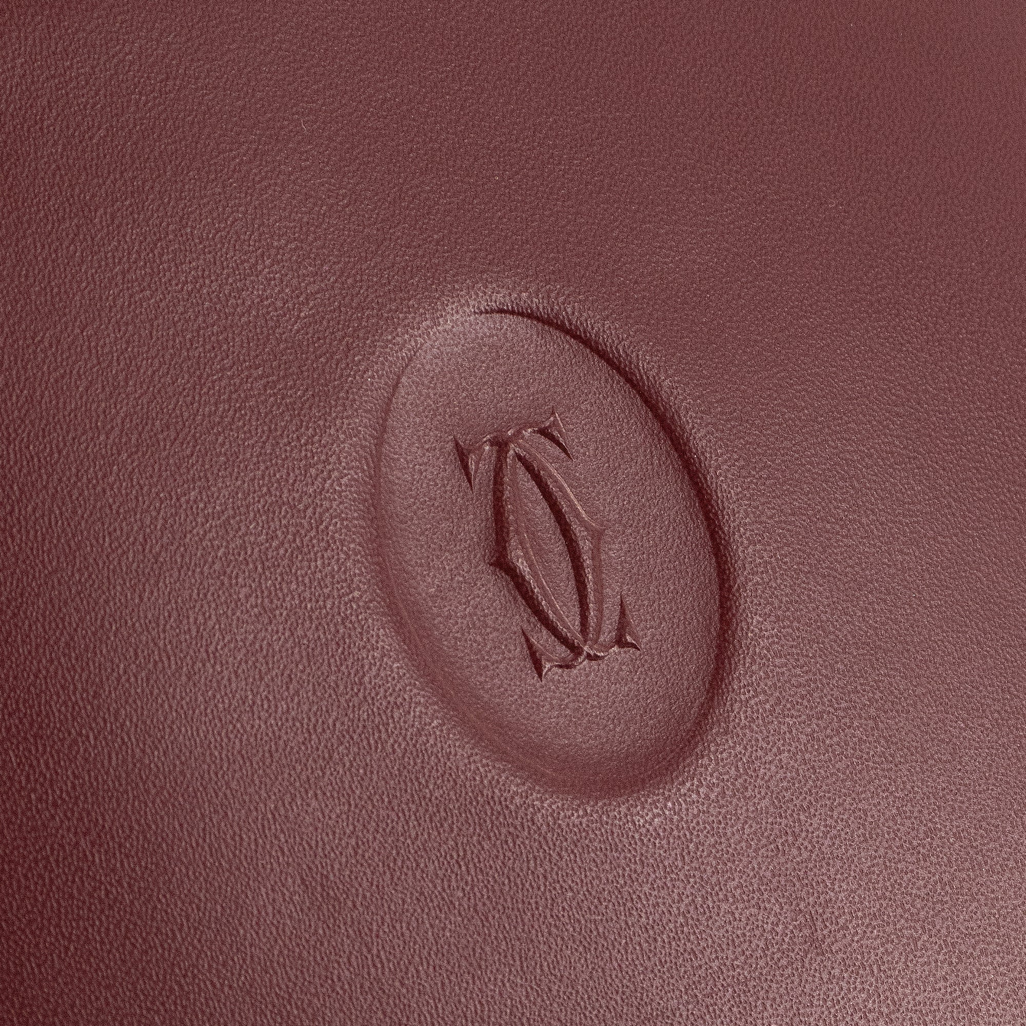 CARTIER - Portefeuille Compact Cartier en cuir bordeaux