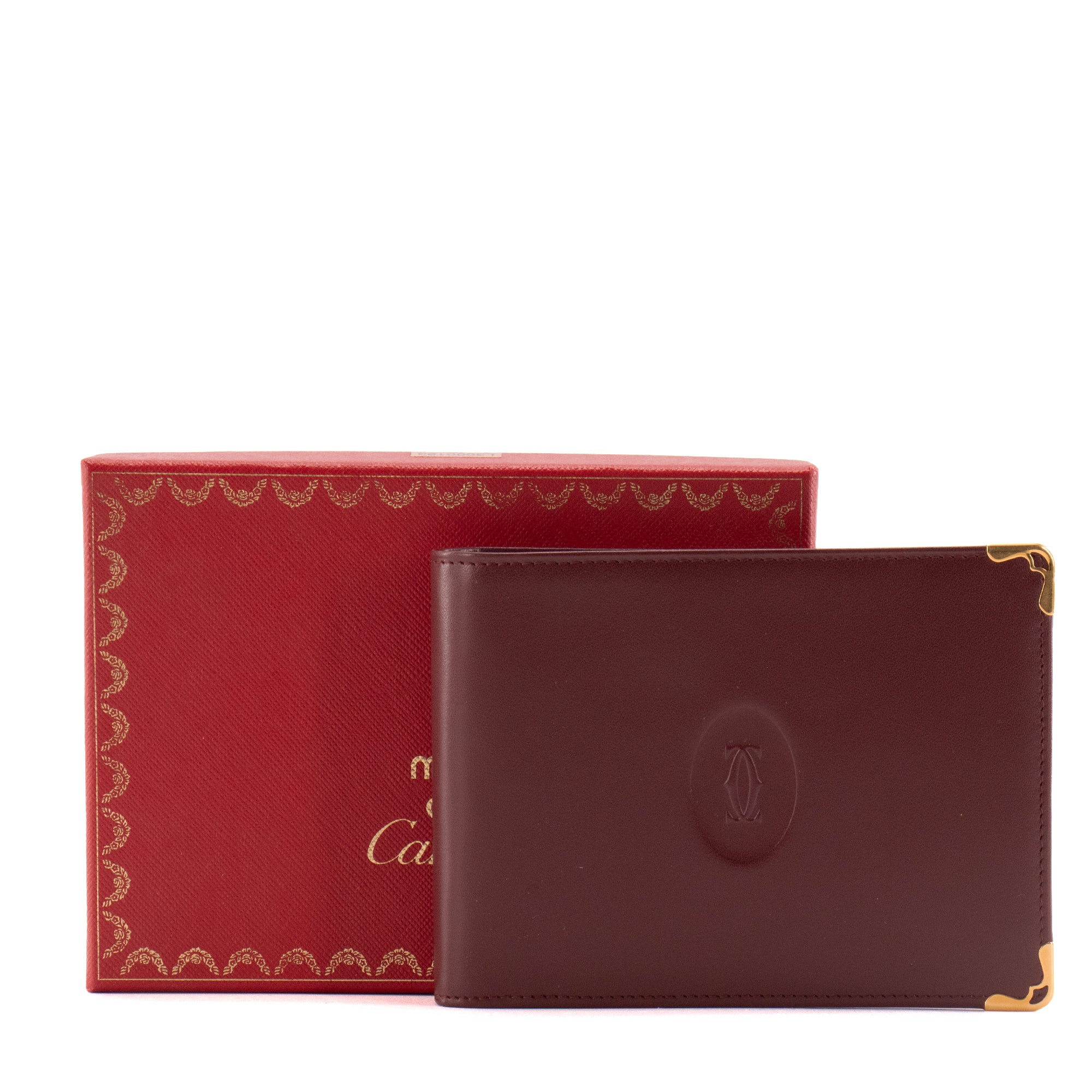 CARTIER - Portefeuille Compact Cartier en cuir bordeaux
