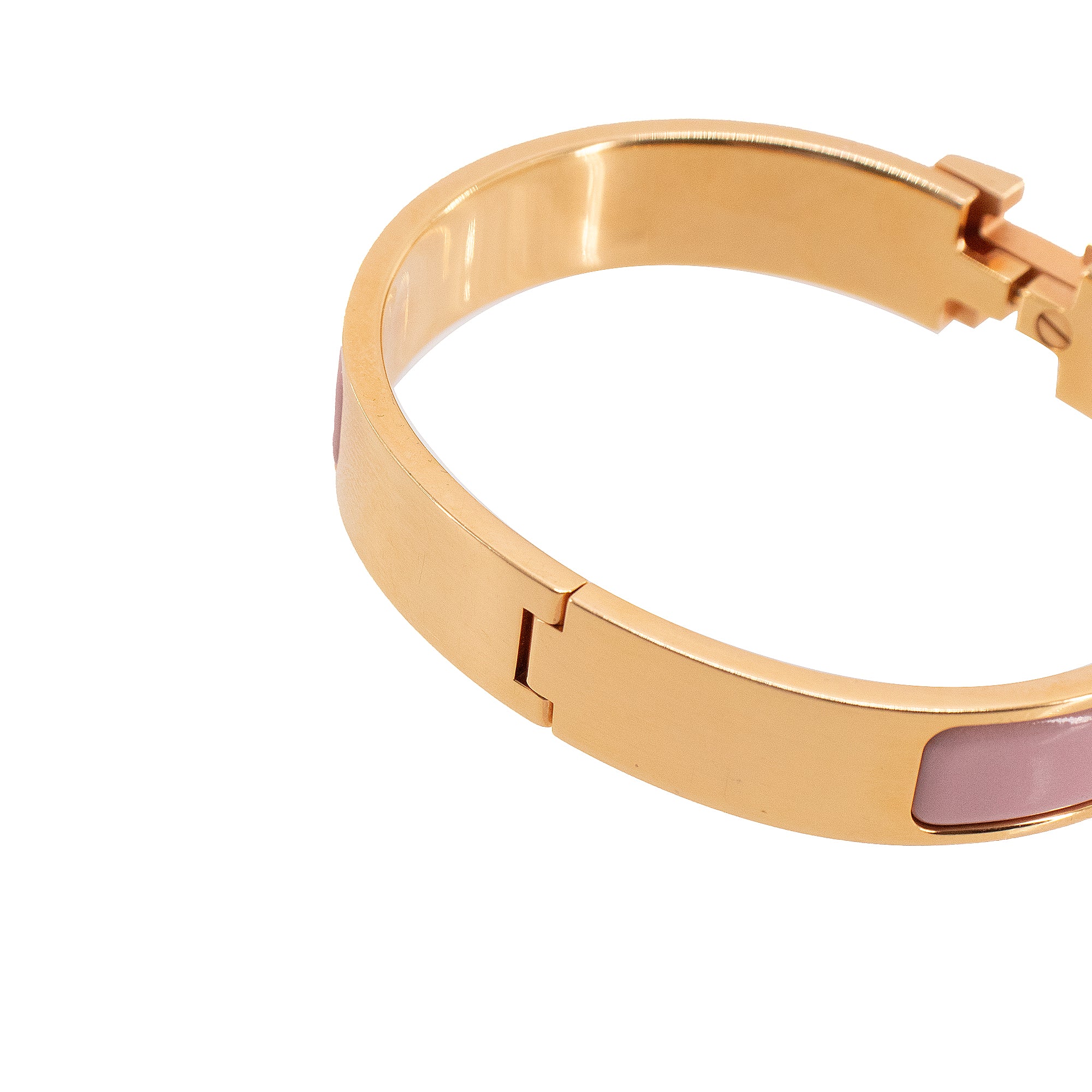 HERMÈS - Bracelet Clic H Hermès en métal doré et émail rose (GM)