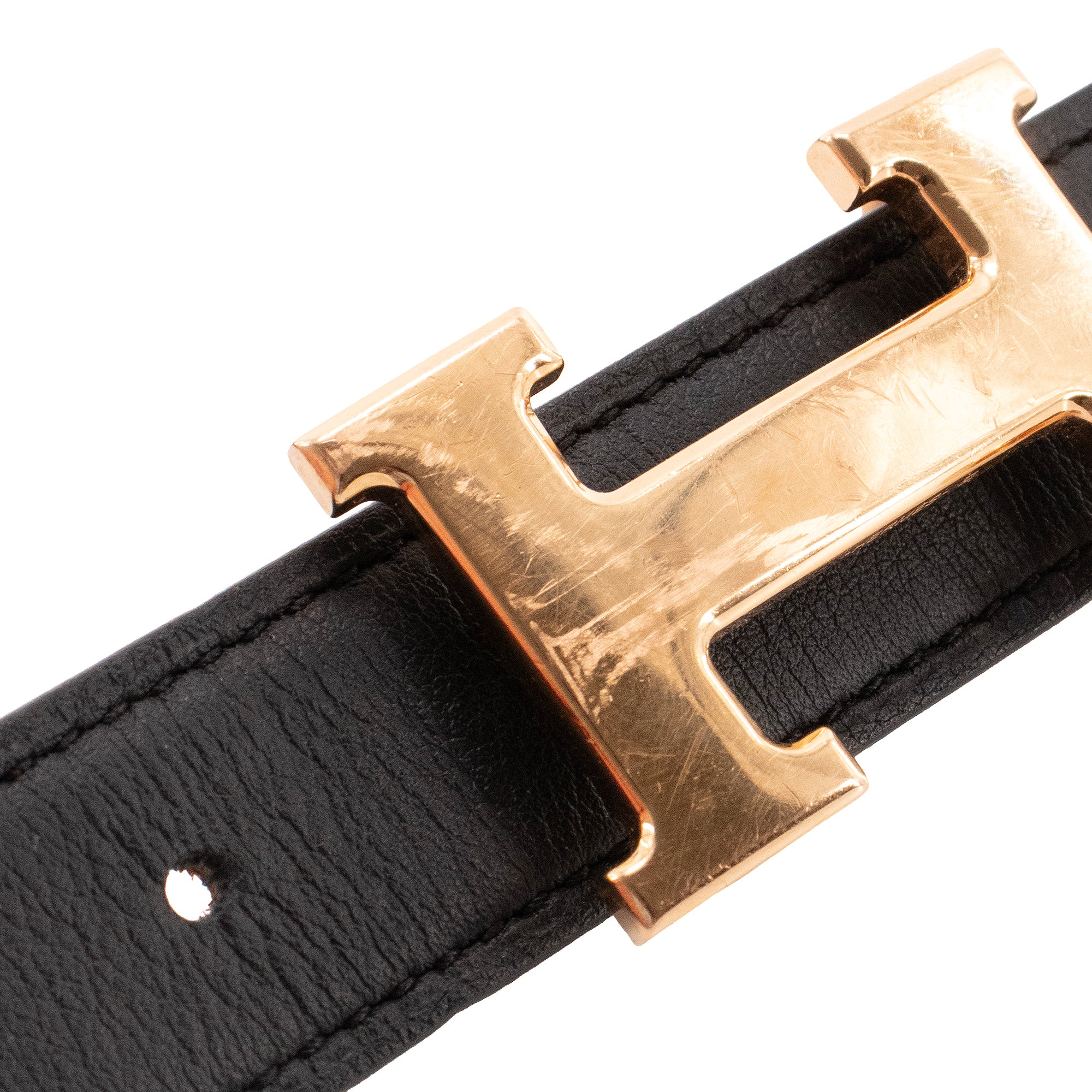 HERMÈS - Ceinture H réversible Hermès en cuir noir et marron (T80)