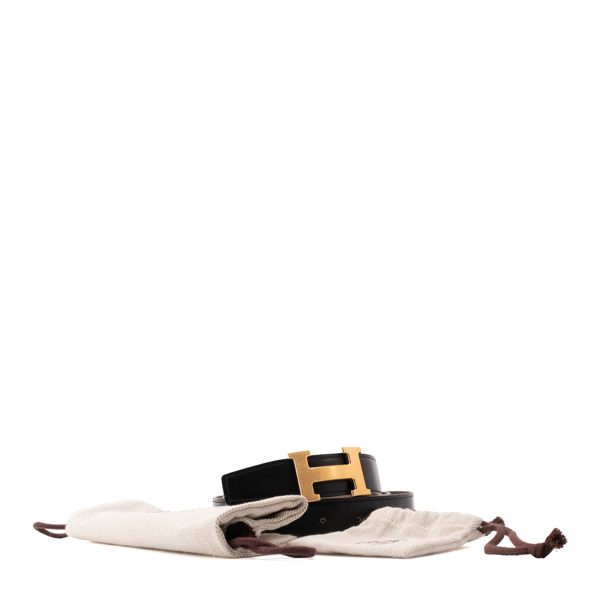 HERMÈS - Ceinture H réversible Hermès en cuir noir et marron (T90)