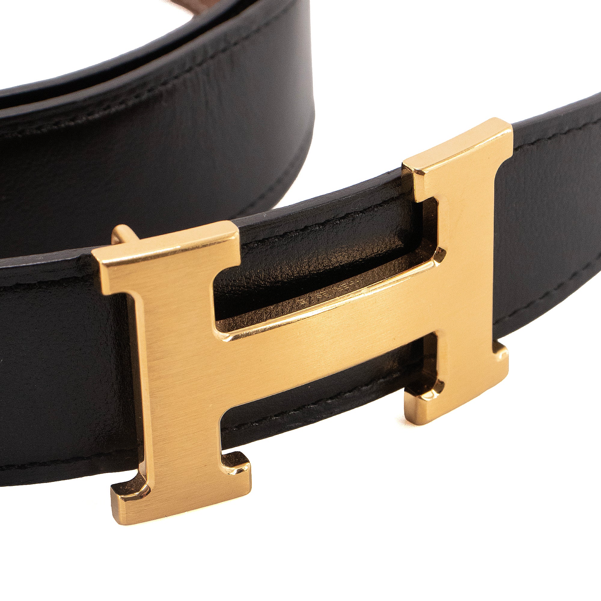 HERMÈS - Ceinture H réversible Hermès en cuir noir et marron (T90)