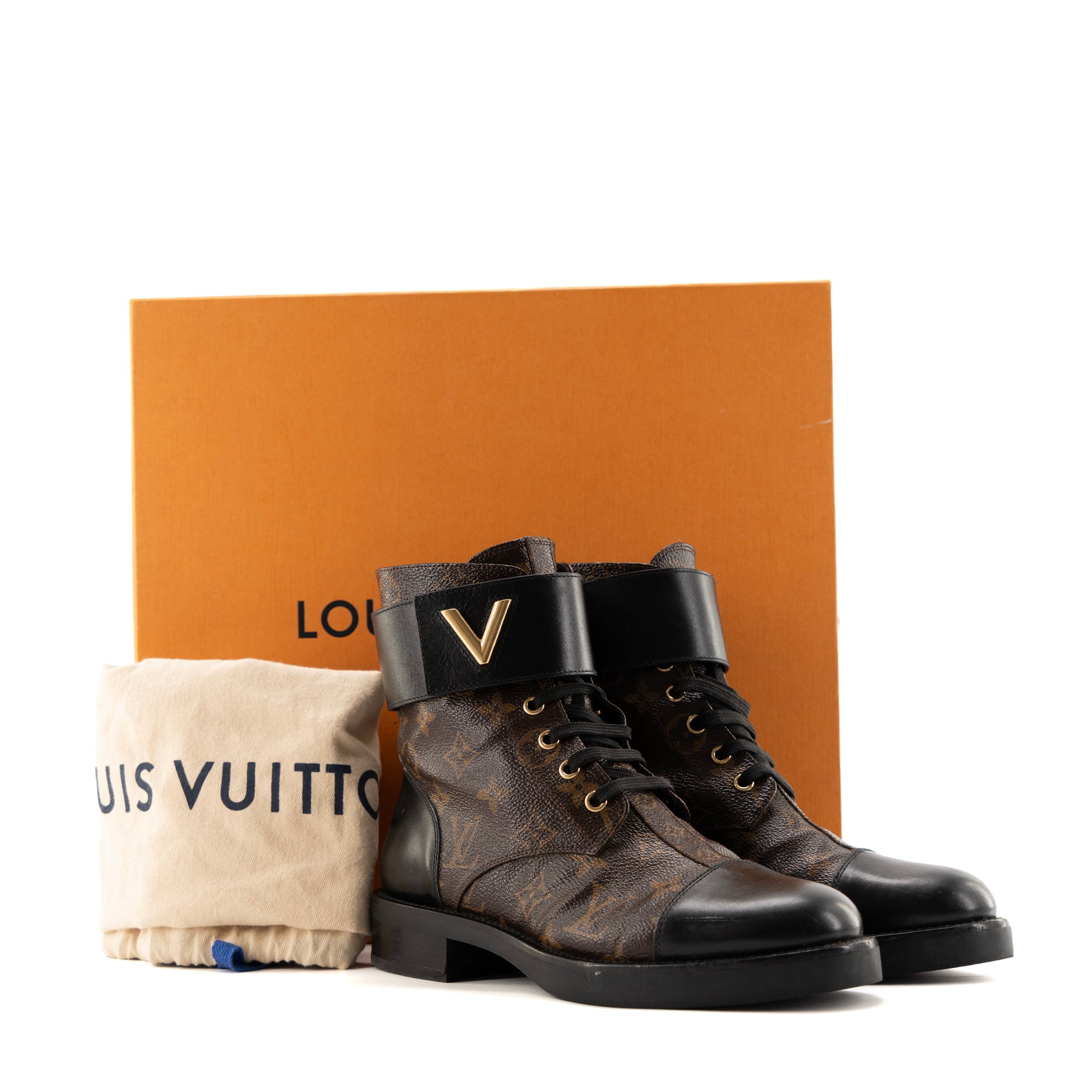 LOUIS VUITTON - Louis Vuitton Wonderland ankle boots in leather and monogrammed canvas (Size 38)