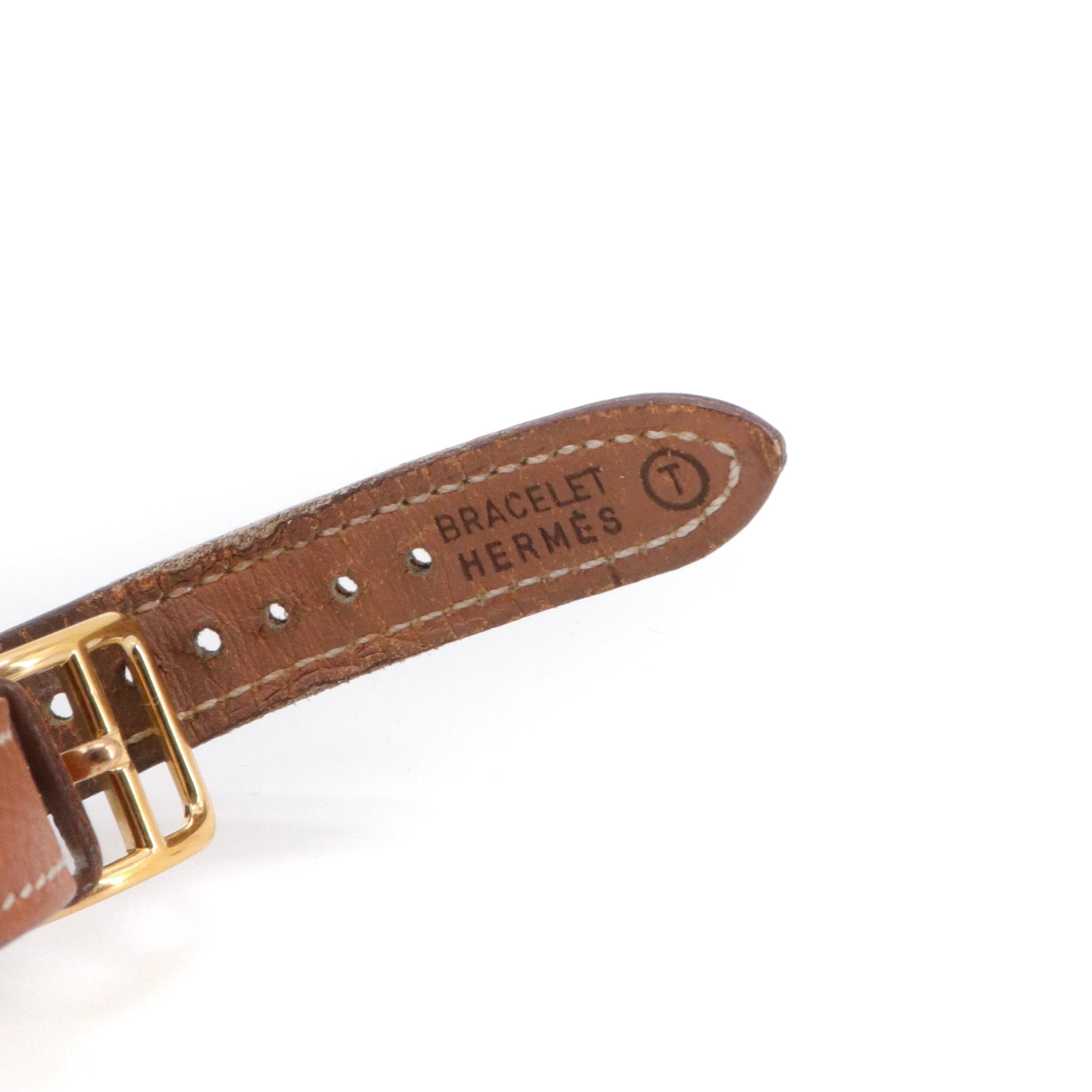HERMÈS - Montre Kelly Hermès en cuir gold