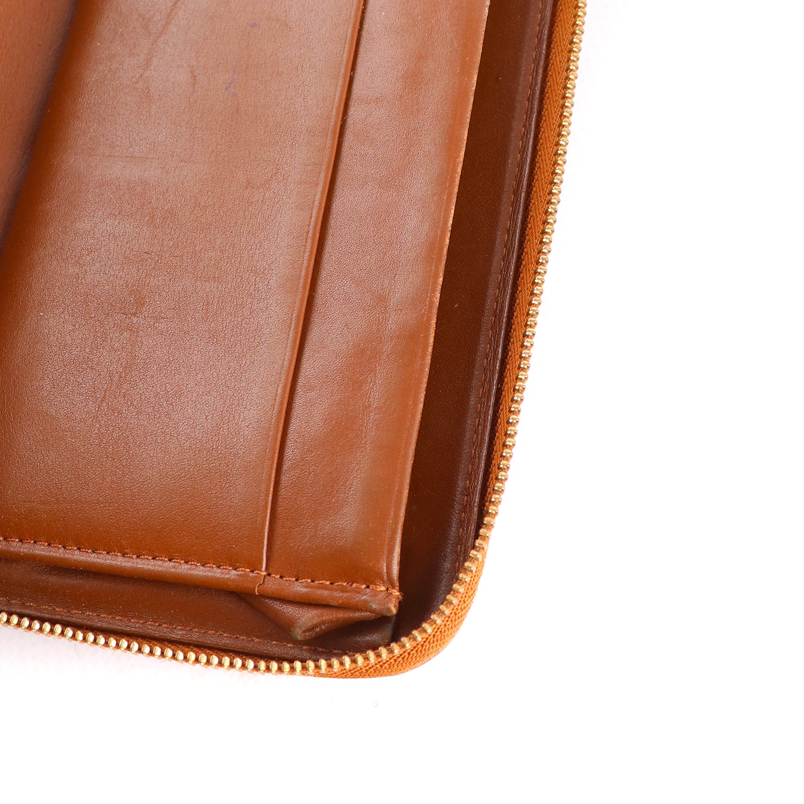 LOUIS VUITTON - Portefeuille en cuir empreinte monogramme verni doré