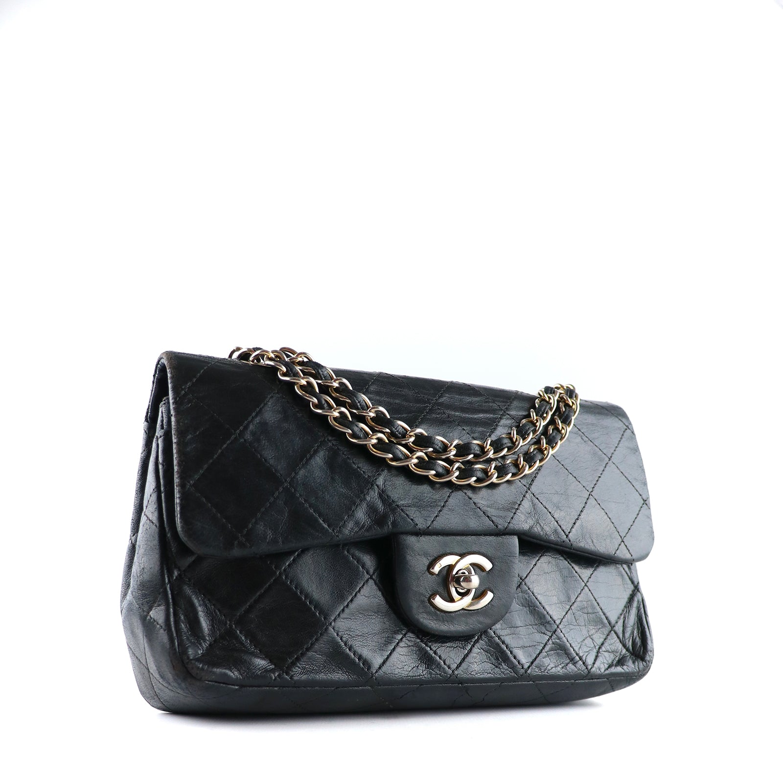 CHANEL - Sac à main Timeless 23 double flap en cuir matelassé noir vintage