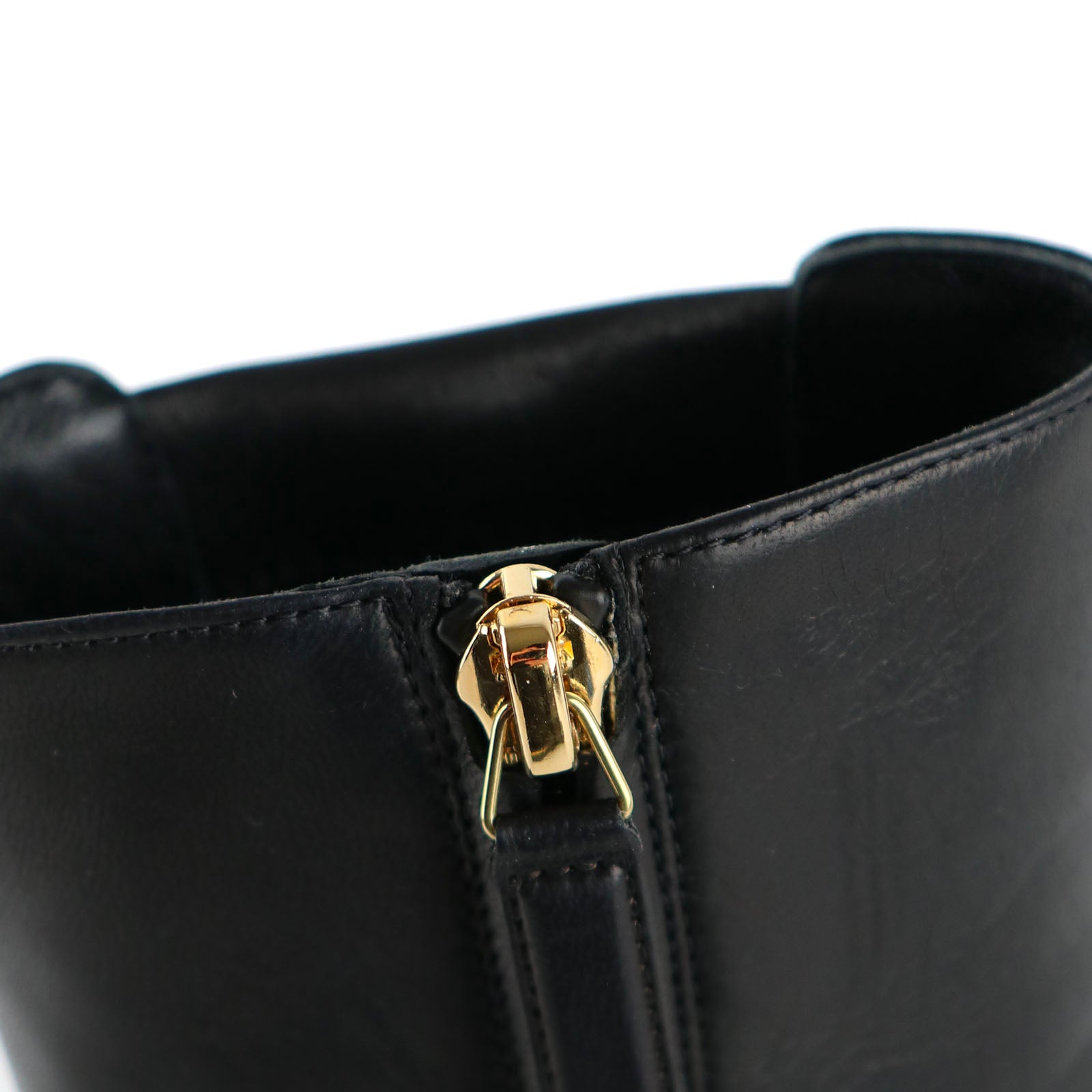 CHANEL - Bottines compensées en cuir noir (T37)