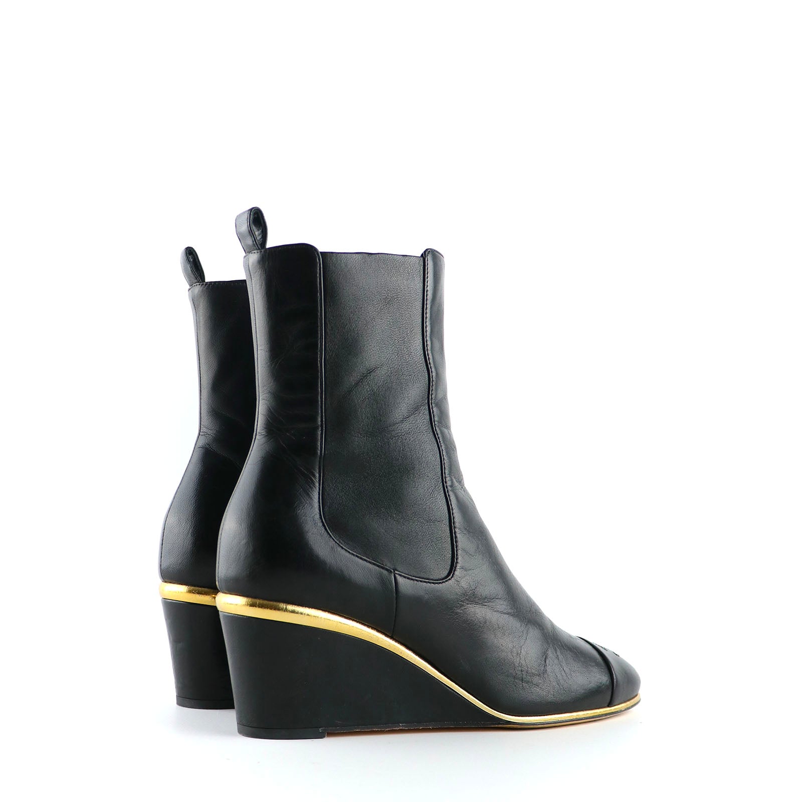 CHANEL - Bottines compensées en cuir noir (T37)