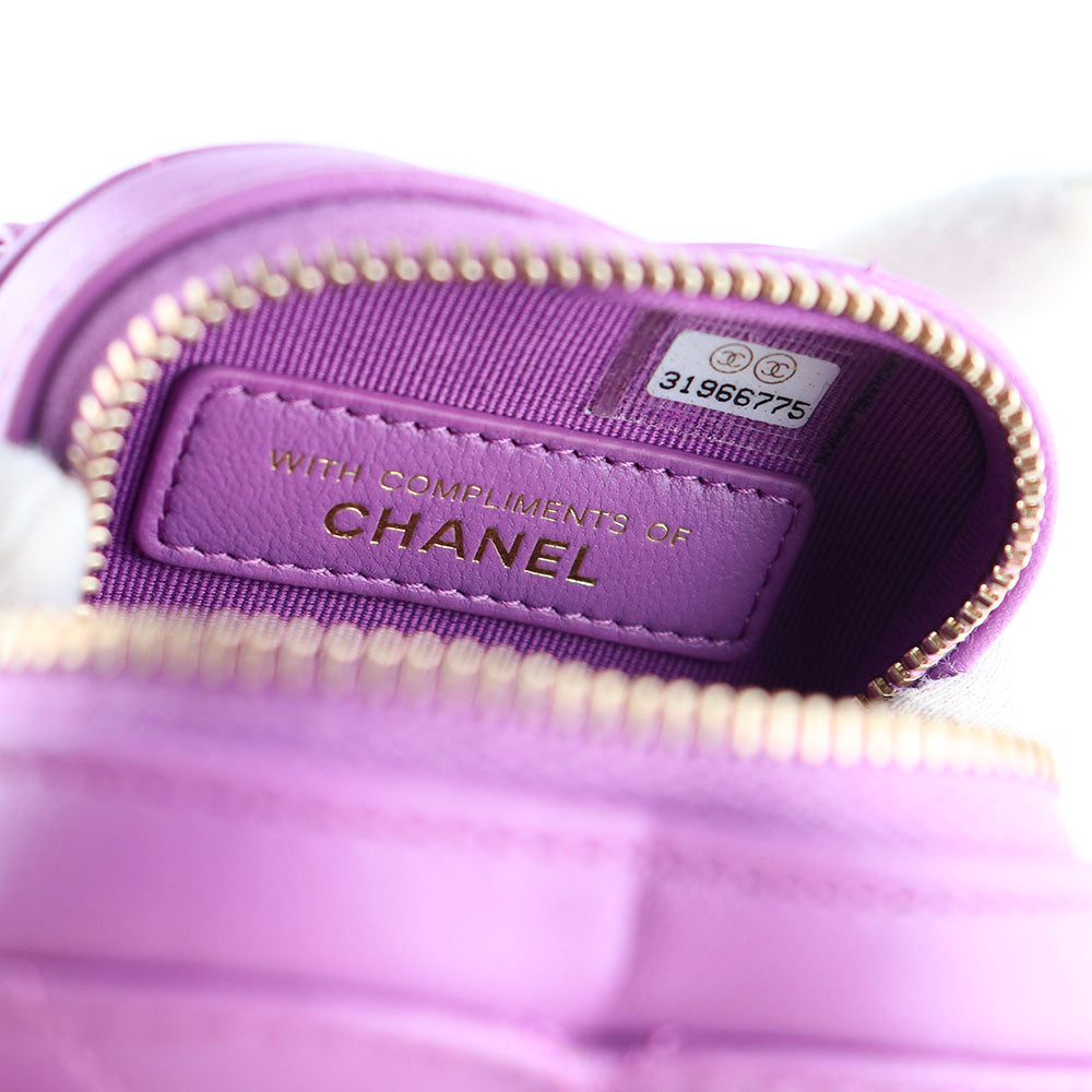 CHANEL - Porte monnaie Cœur en cuir matelassé avec élastique
