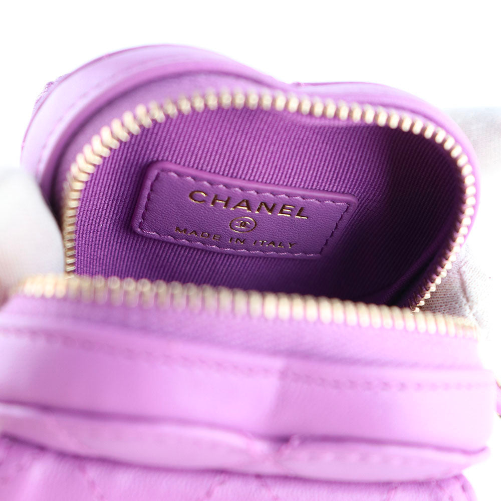 CHANEL - Porte monnaie Cœur en cuir matelassé avec élastique