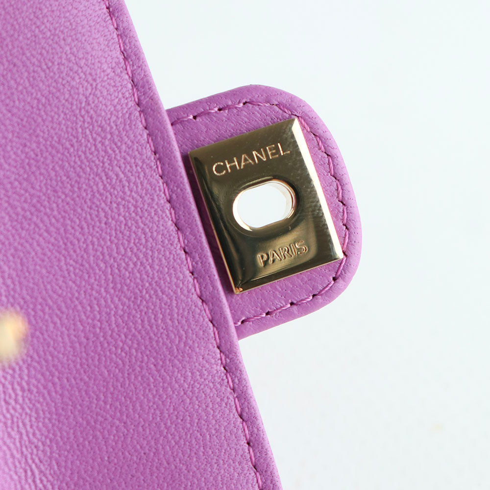 CHANEL - Porte monnaie Cœur en cuir matelassé avec élastique