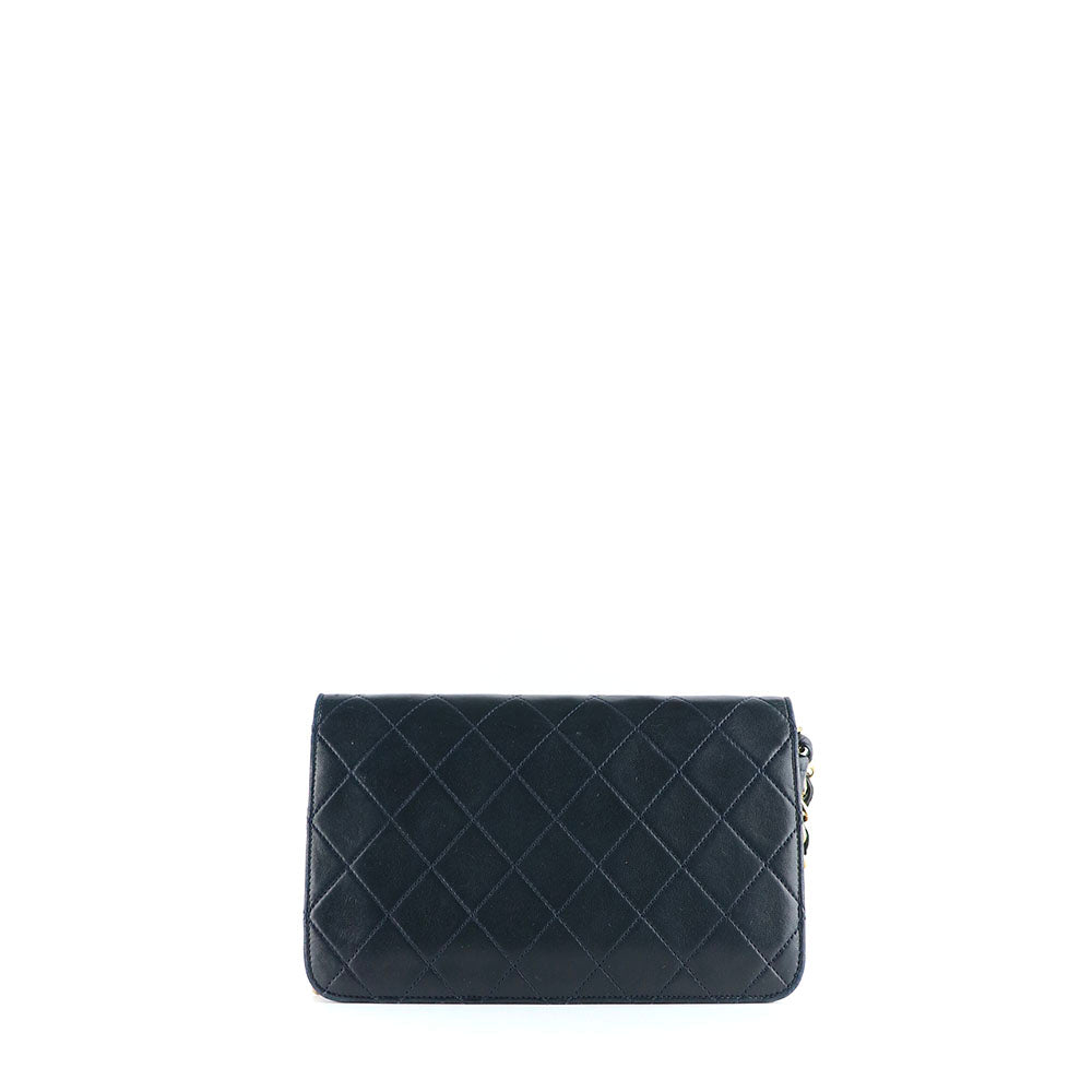 CHANEL - Sac classique à rabat vintage en cuir bleu marine