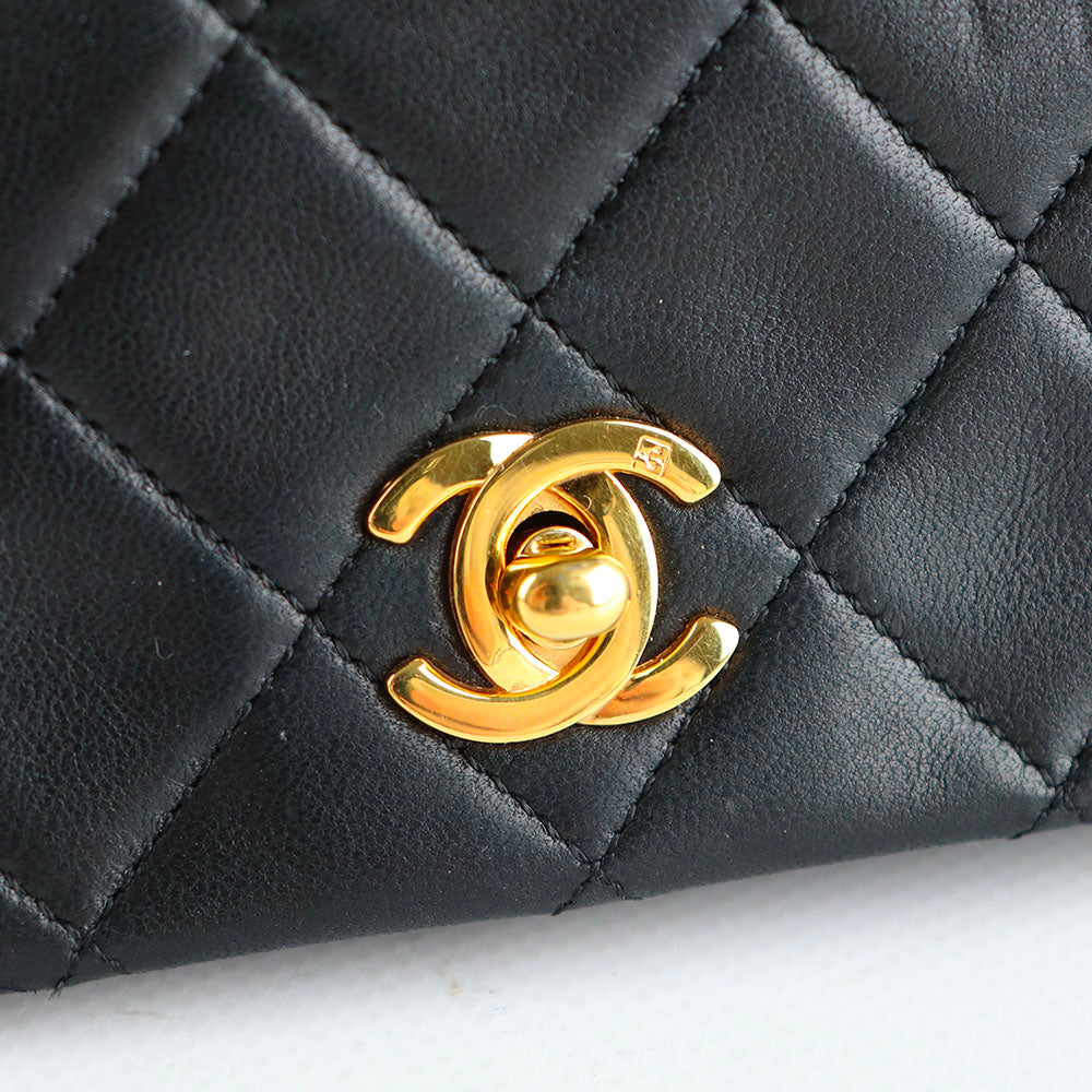 CHANEL - Sac à bandoulière Mademoiselle vintage en cuir matelassé