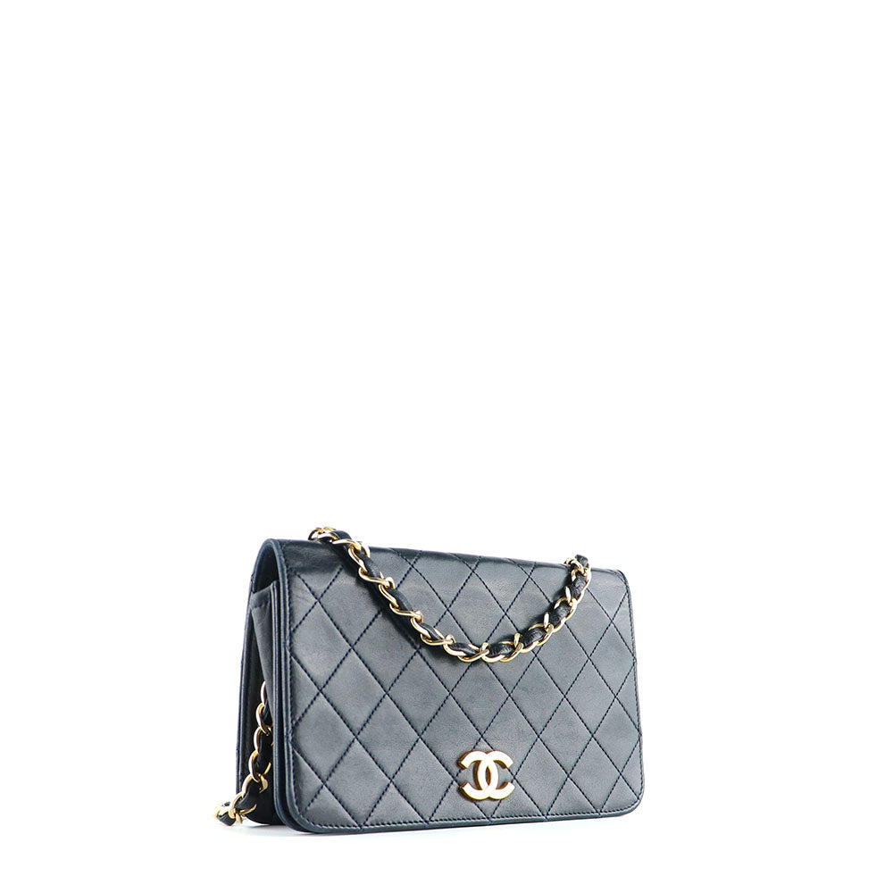 CHANEL - Sac classique à rabat vintage en cuir bleu marine