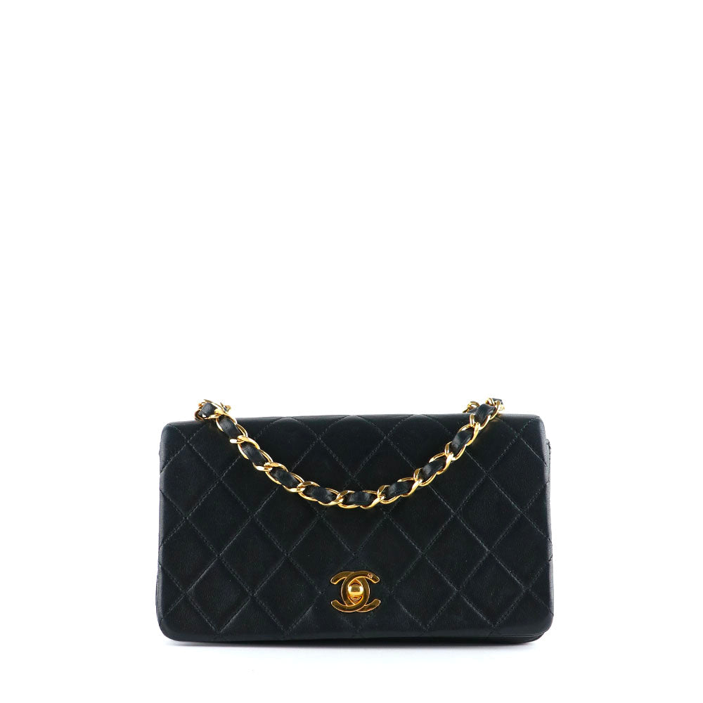 CHANEL - Sac à bandoulière Mademoiselle vintage en cuir matelassé