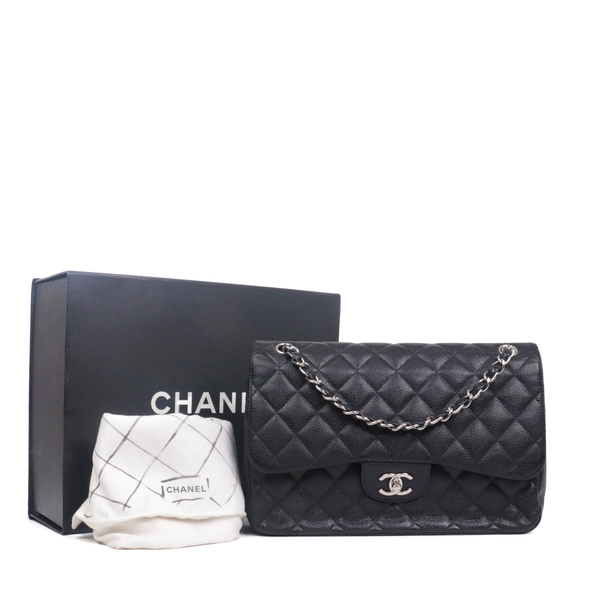 CHANEL - Sac à bandoulière Classique/Timeless Jumbo double flap en cuir caviar noir