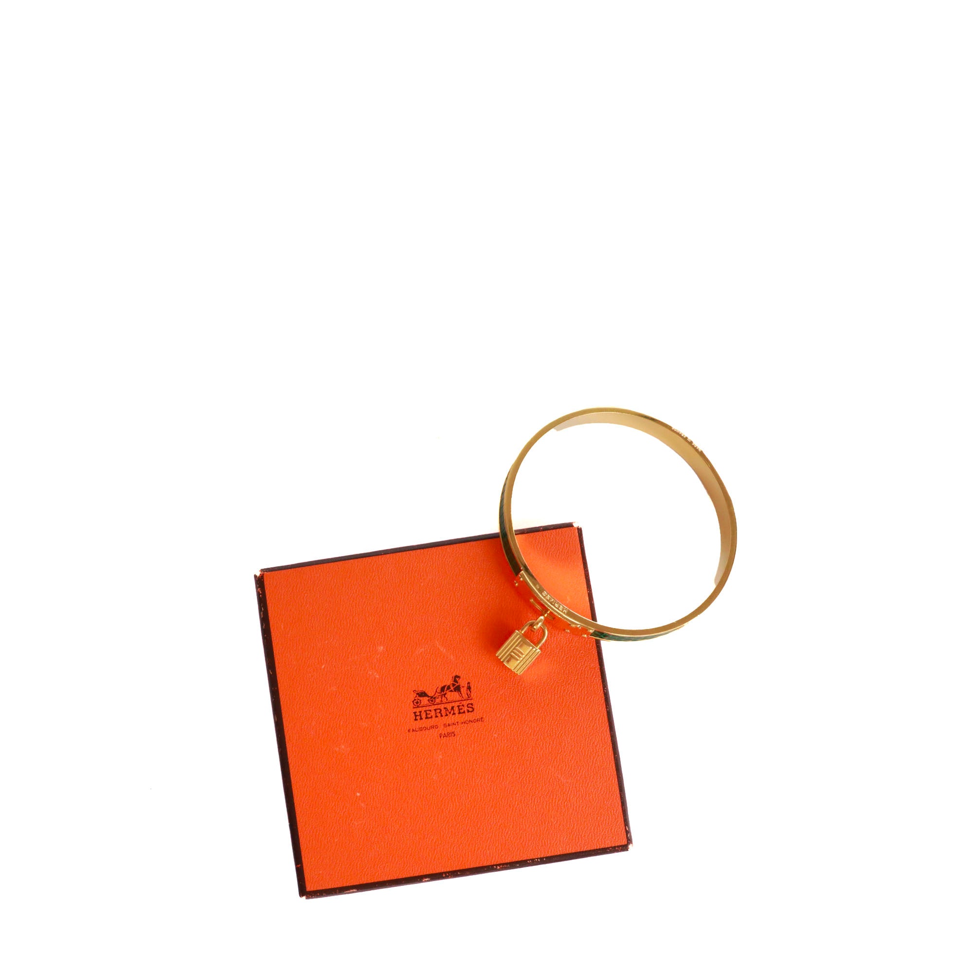 HERMÈS - Bracelet Kelly Cadenas Hermès en métal doré et cuir exotique vert