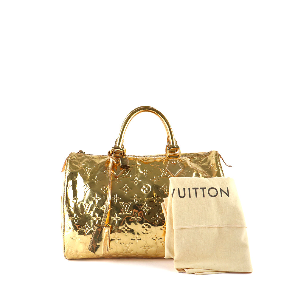 LOUIS VUITTON - Sac à main Speedy 30 en cuir verni miroir doré