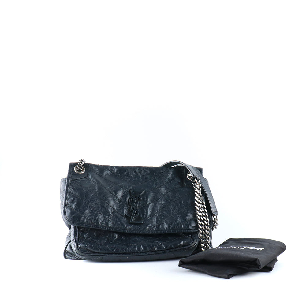 SAINT LAURENT - Sac à bandoulière Niki Medium en cuir noir