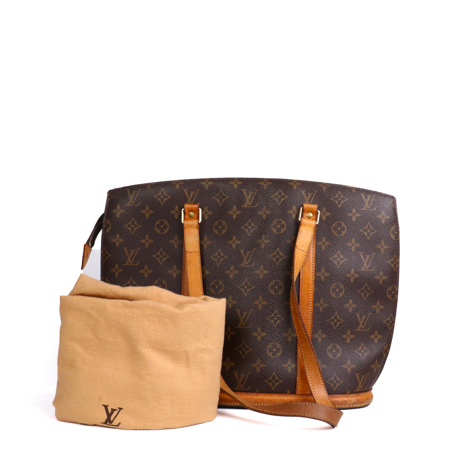 LOUIS VUITTON - Sac cabas Babylone Louis Vuitton en toile monogrammée marron vintage