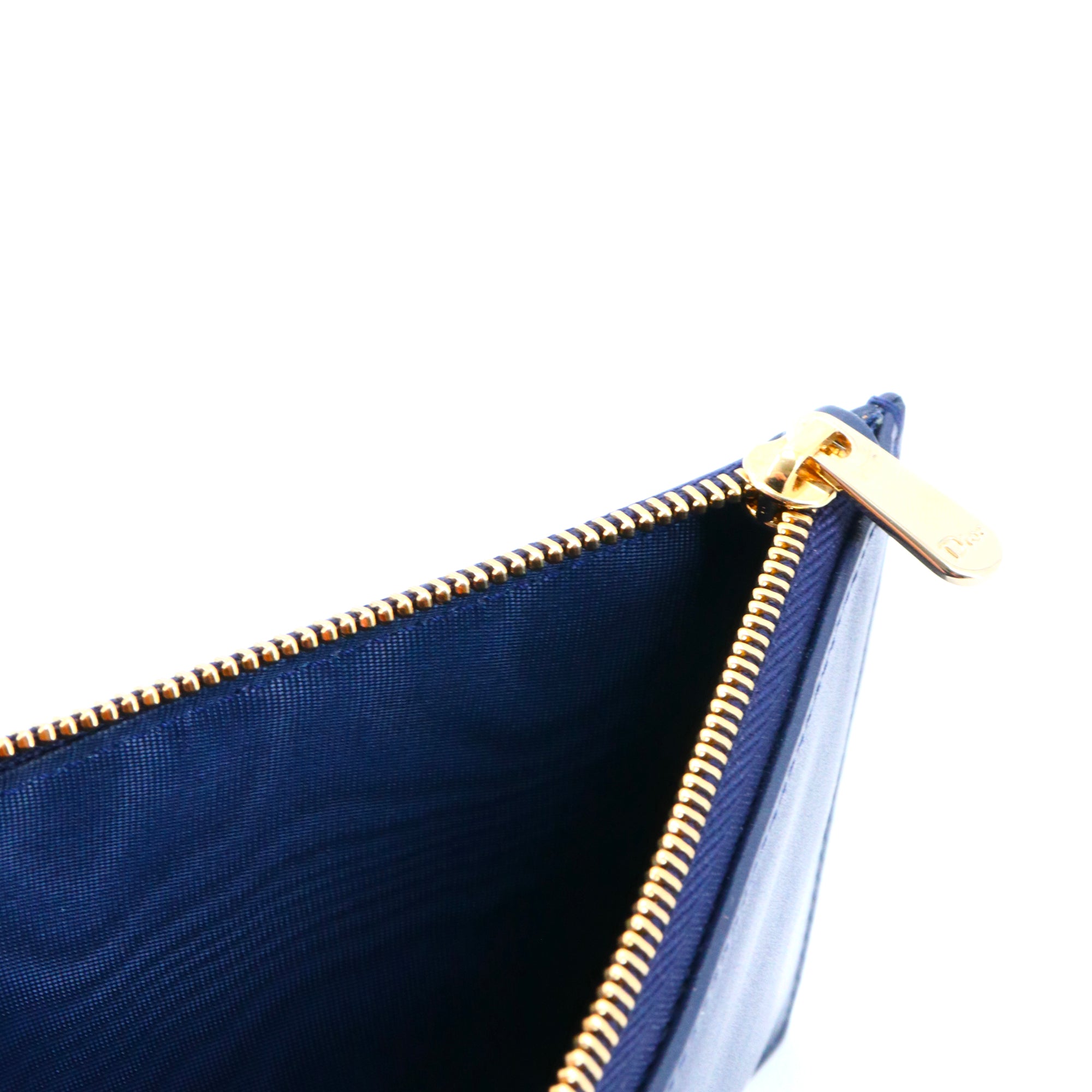 DIOR - Porte-monnaie Dior en cuir bleu marine