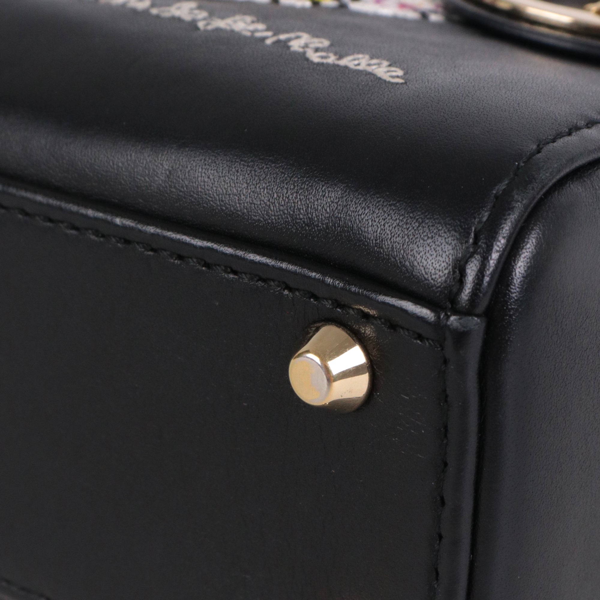 DIOR - Sac à main Lady Dior mini en cuir noir édition limitée
