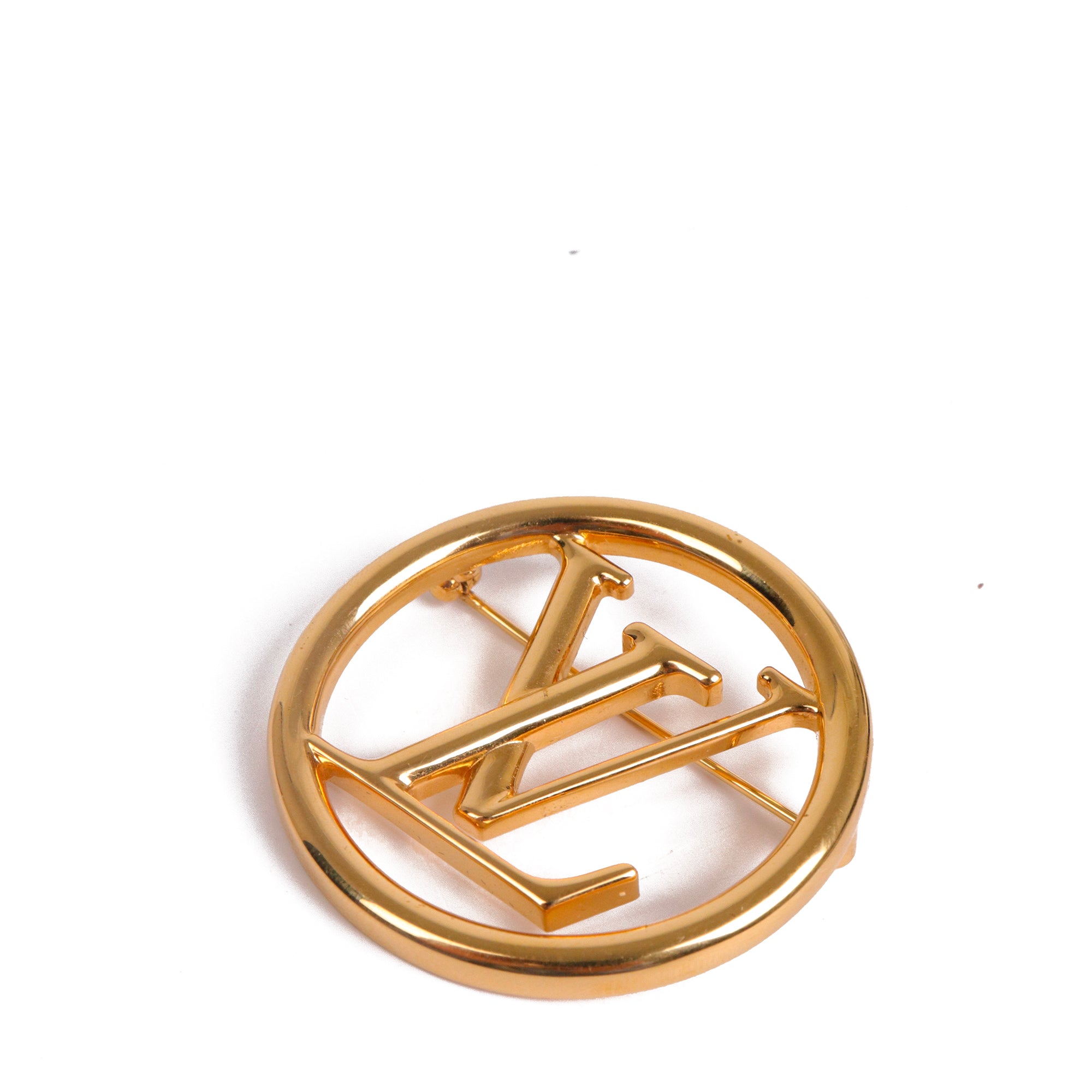 LOUIS VUITTON - Broche Initial Louis Vuitton en métal doré