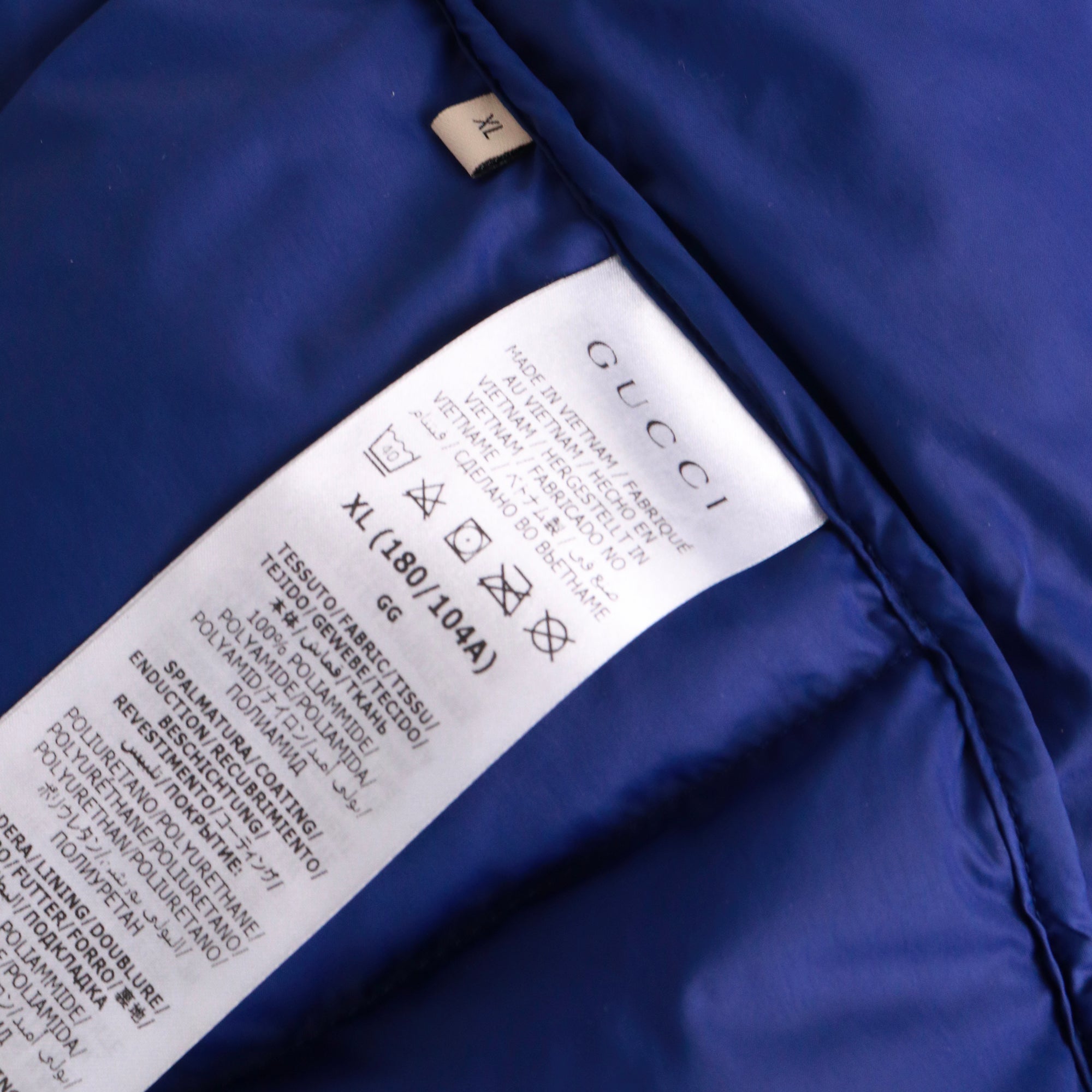 GUCCI - Doudoune Gucci x TheNorthFace en toile bleu et marron (XL)
