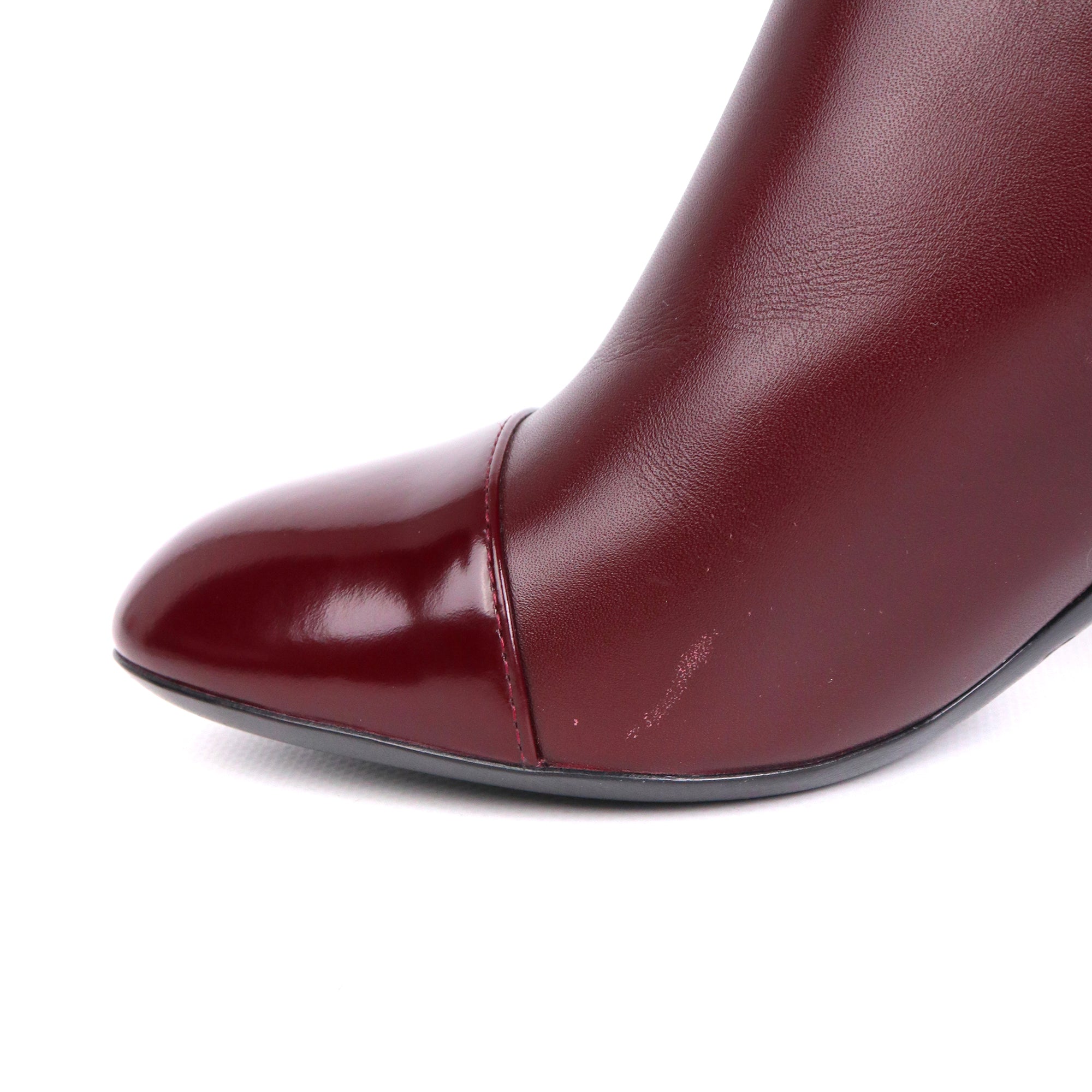 LOUIS VUITTON - Bottines Louis Vuitton en cuir bordeaux
