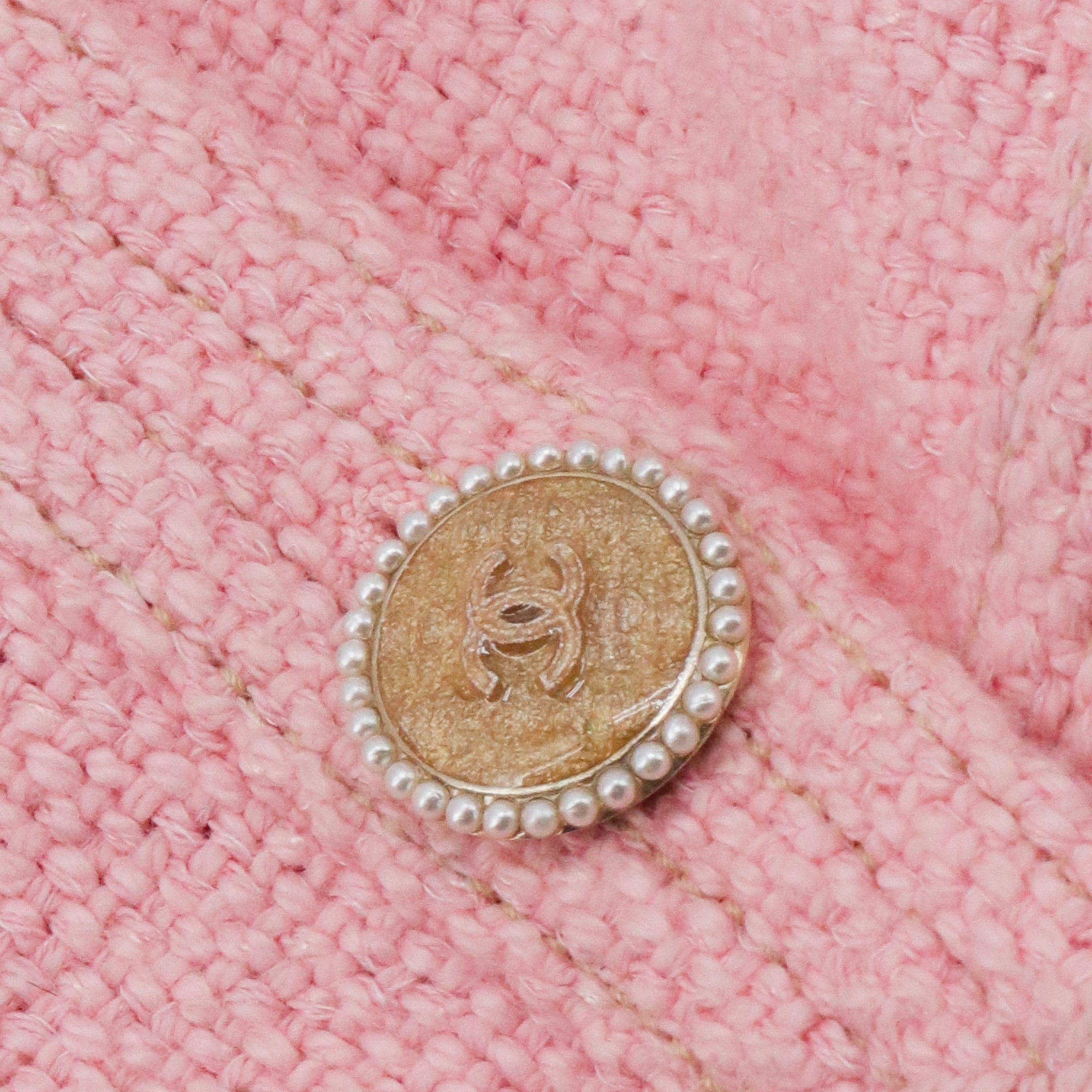 CHANEL - Veste courte Chanel en tweed rose (T40)