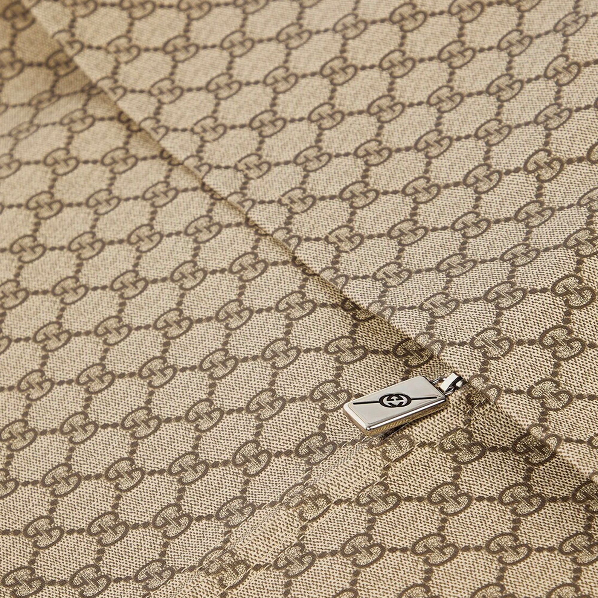 GUCCI - Housse de vêtements Gucci en toile monogrammée