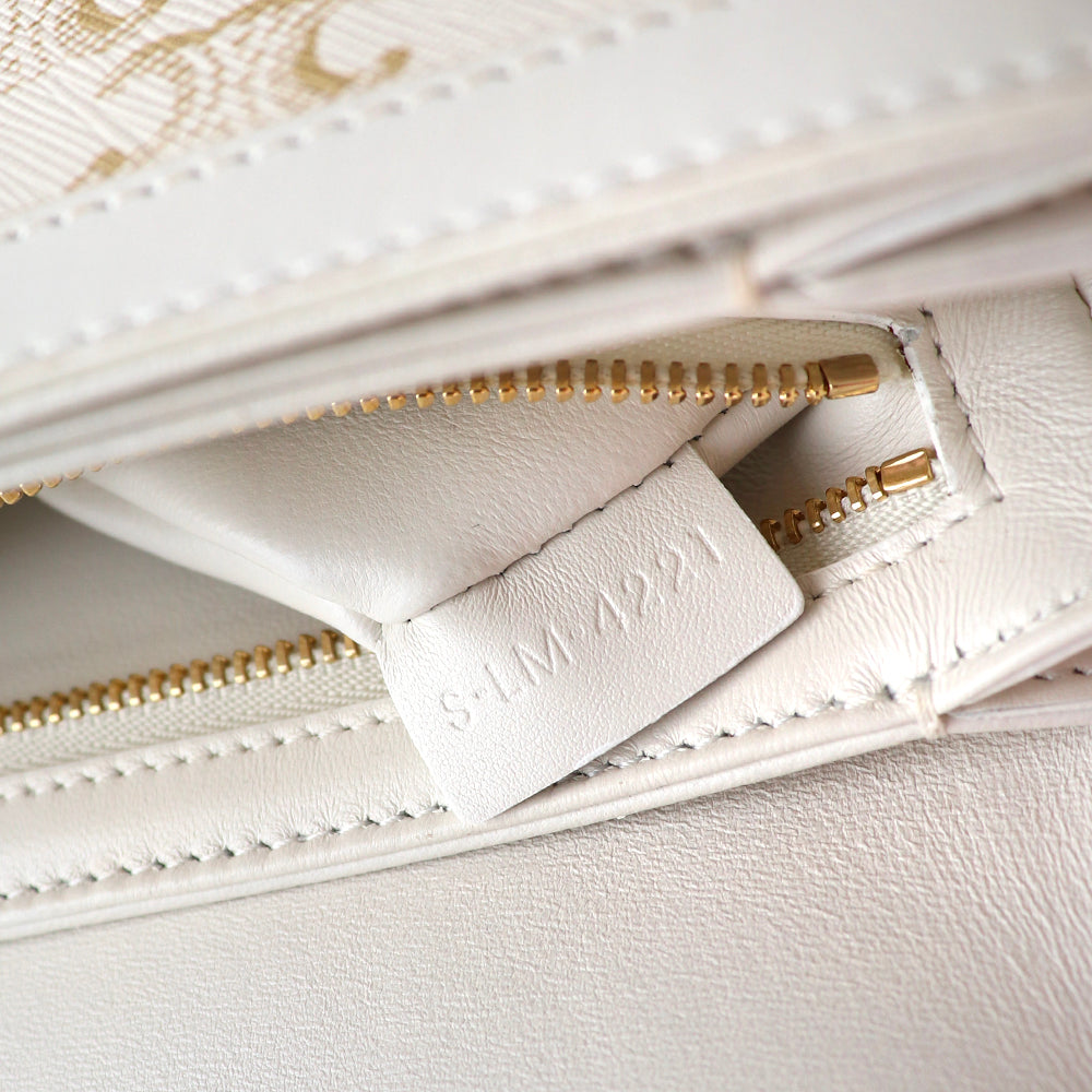 CELINE - Triomphe teen shoulder bag in white leather and monogram coated canvas