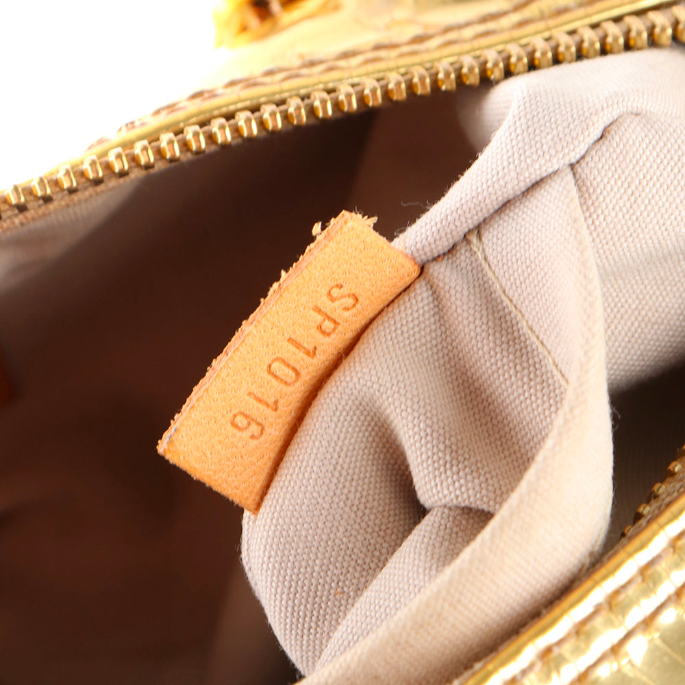 LOUIS VUITTON - Sac à main Speedy 30 en cuir verni miroir doré