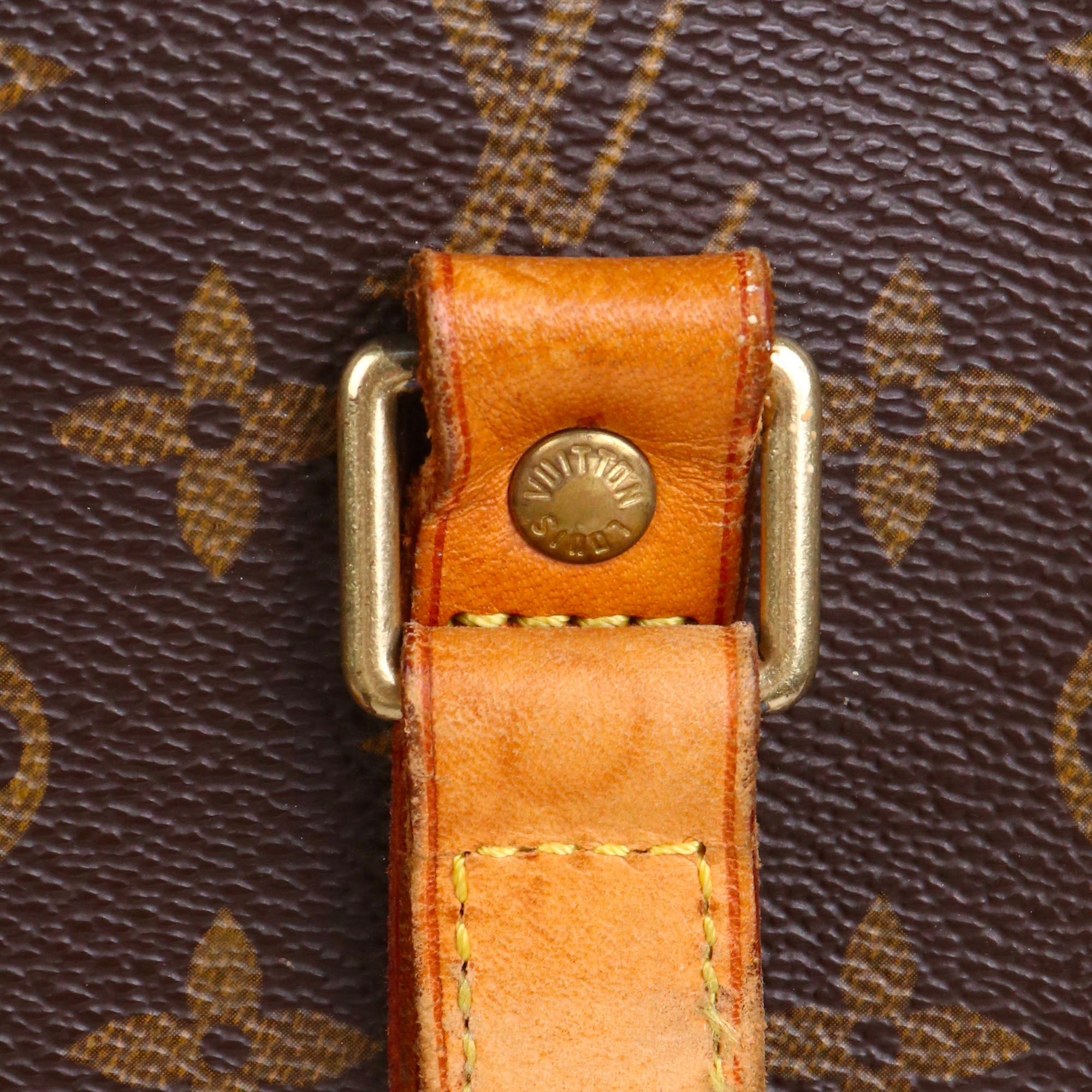 LOUIS VUITTON - Sac cabas Babylone Louis Vuitton en toile monogrammée marron vintage