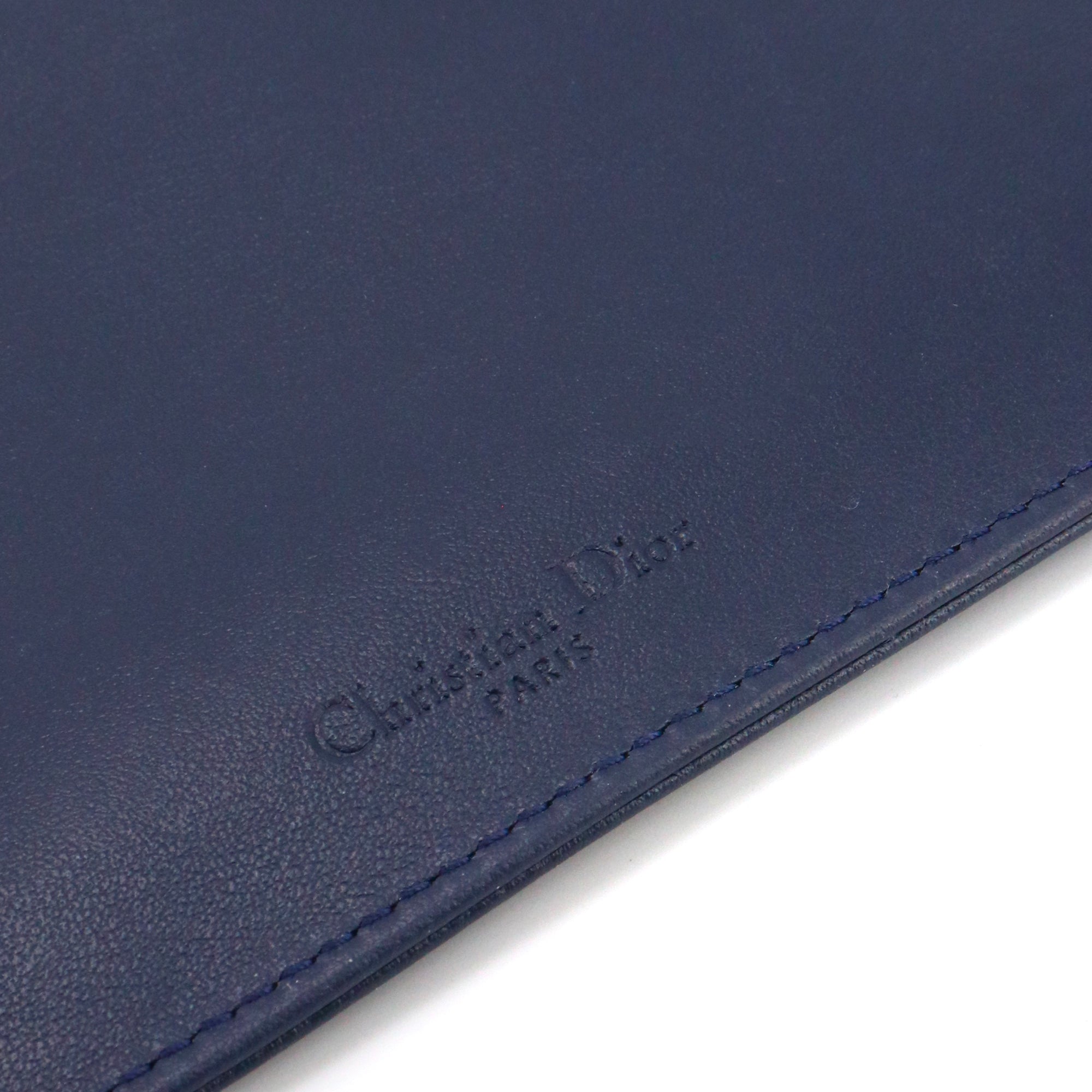 DIOR - Porte-monnaie Dior en cuir bleu marine