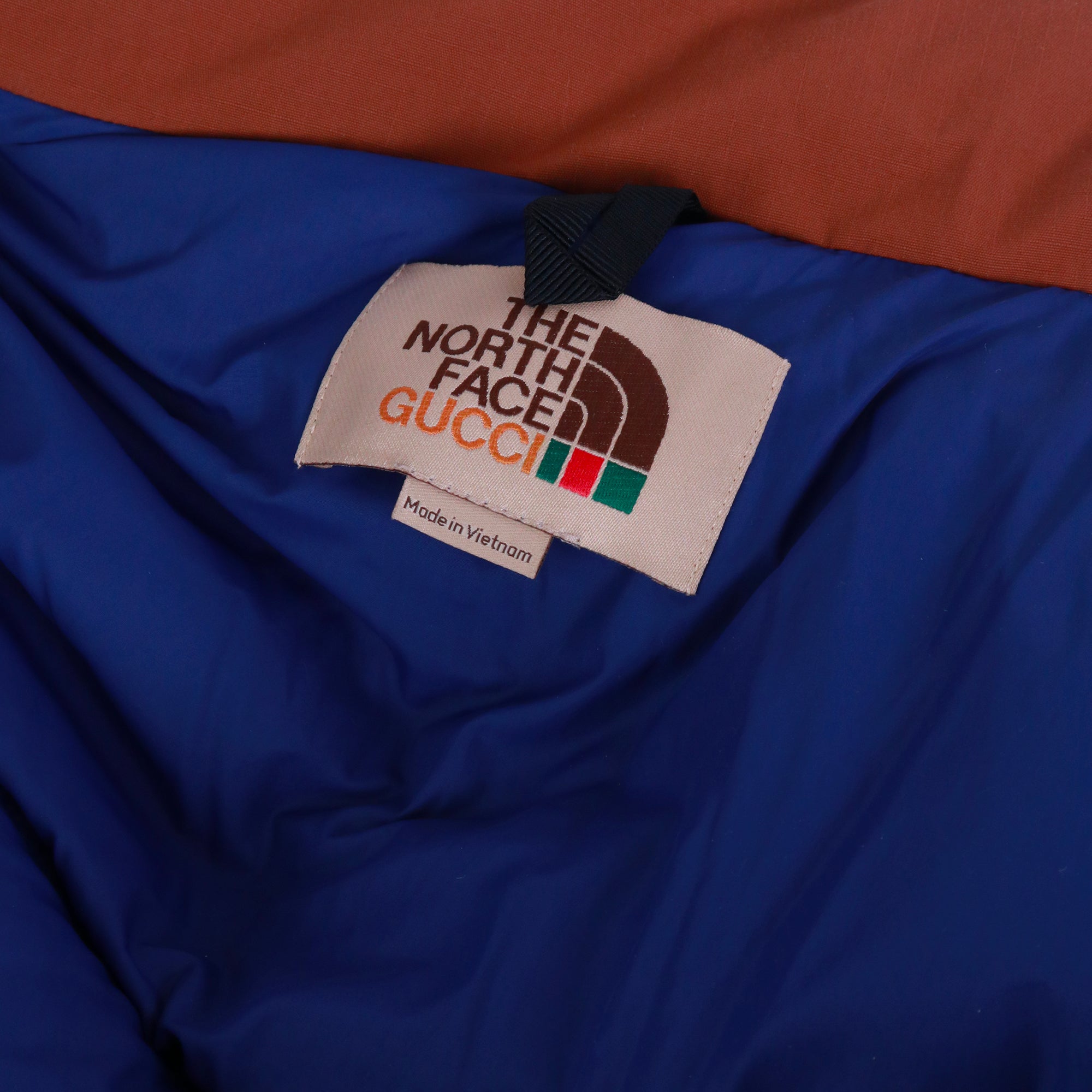 GUCCI - Doudoune Gucci x TheNorthFace en toile bleu et marron (XL)