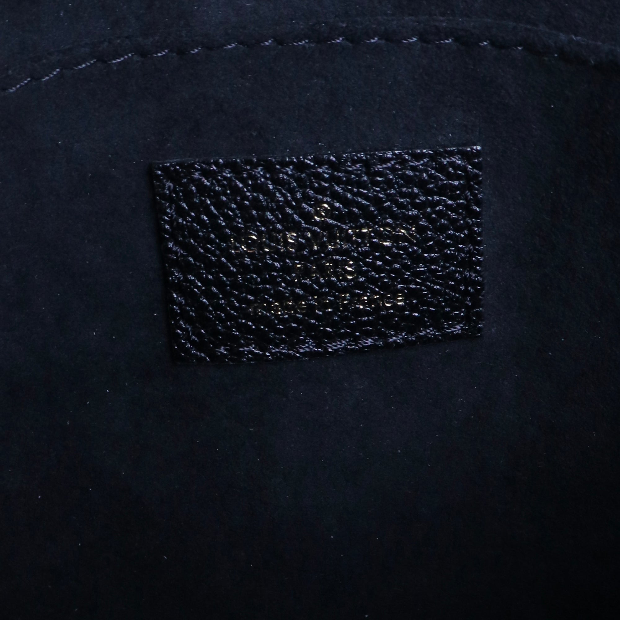 LOUIS VUITTON - Sac à bandoulière Madeleine MM Louis Vuitton en cuir grainé noir