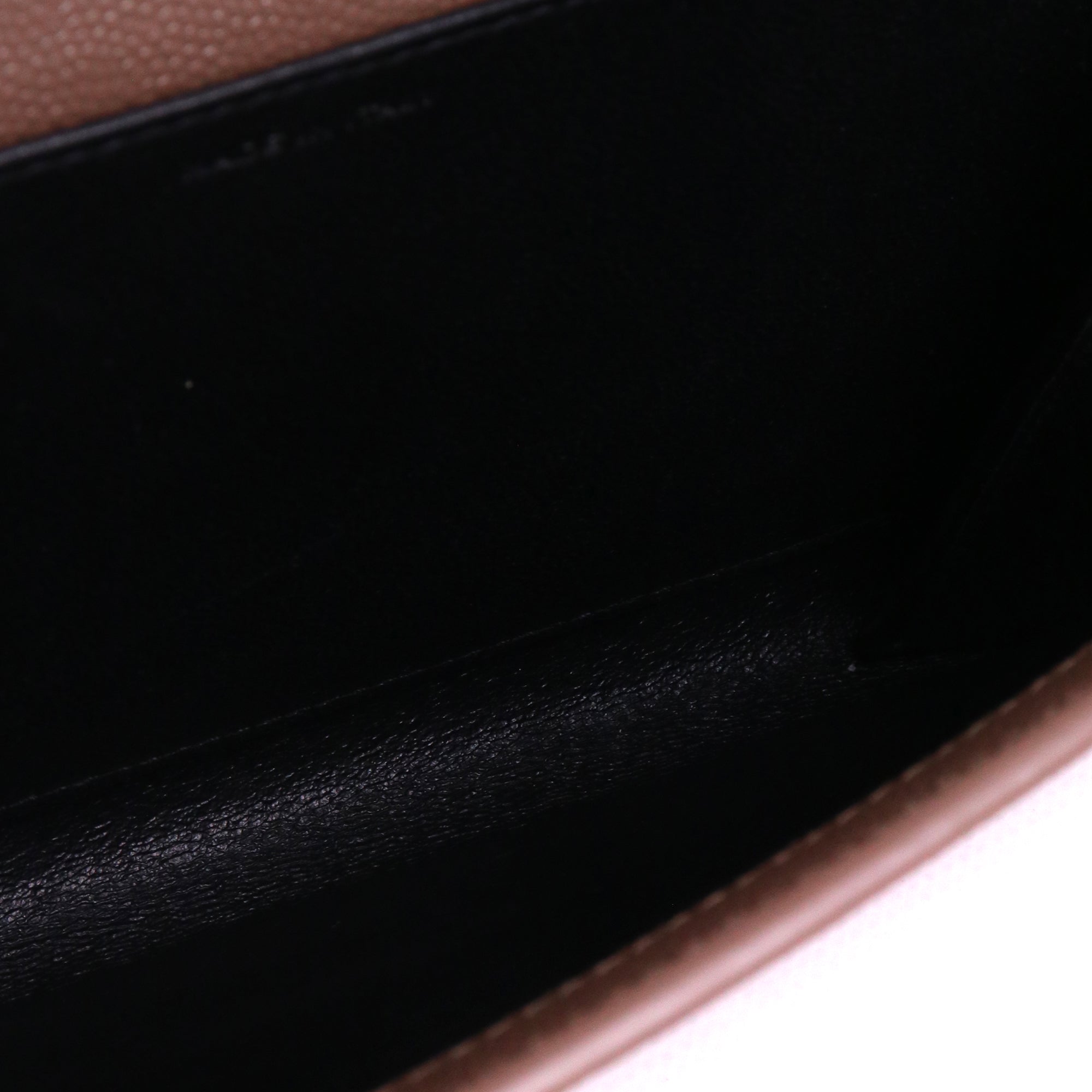 SAINT LAURENT - Saint Laurent Cassandre clutch in black chevron leather