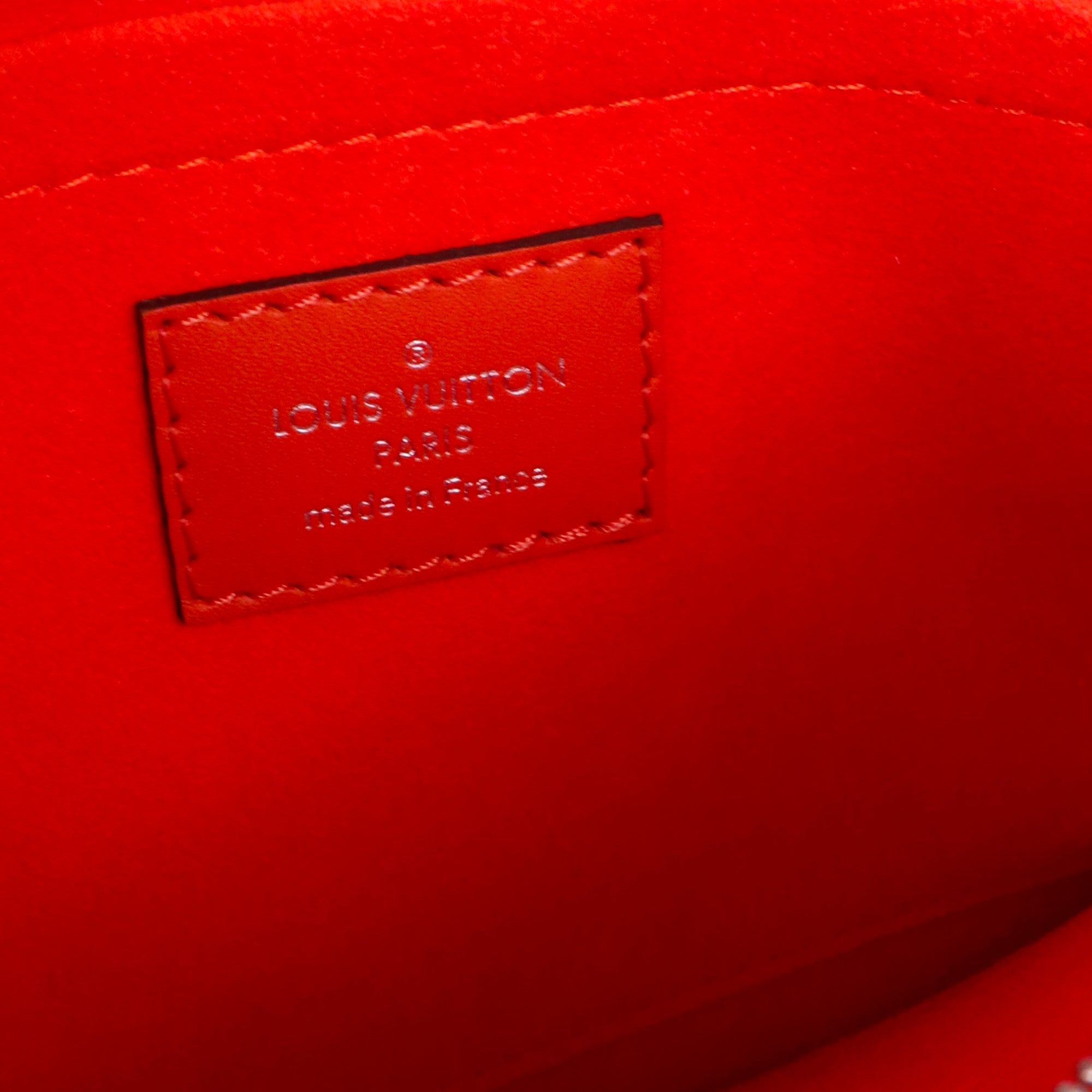 LOUIS VUITTON - Pochette Neverfull Louis Vuitton en cuir épi orange