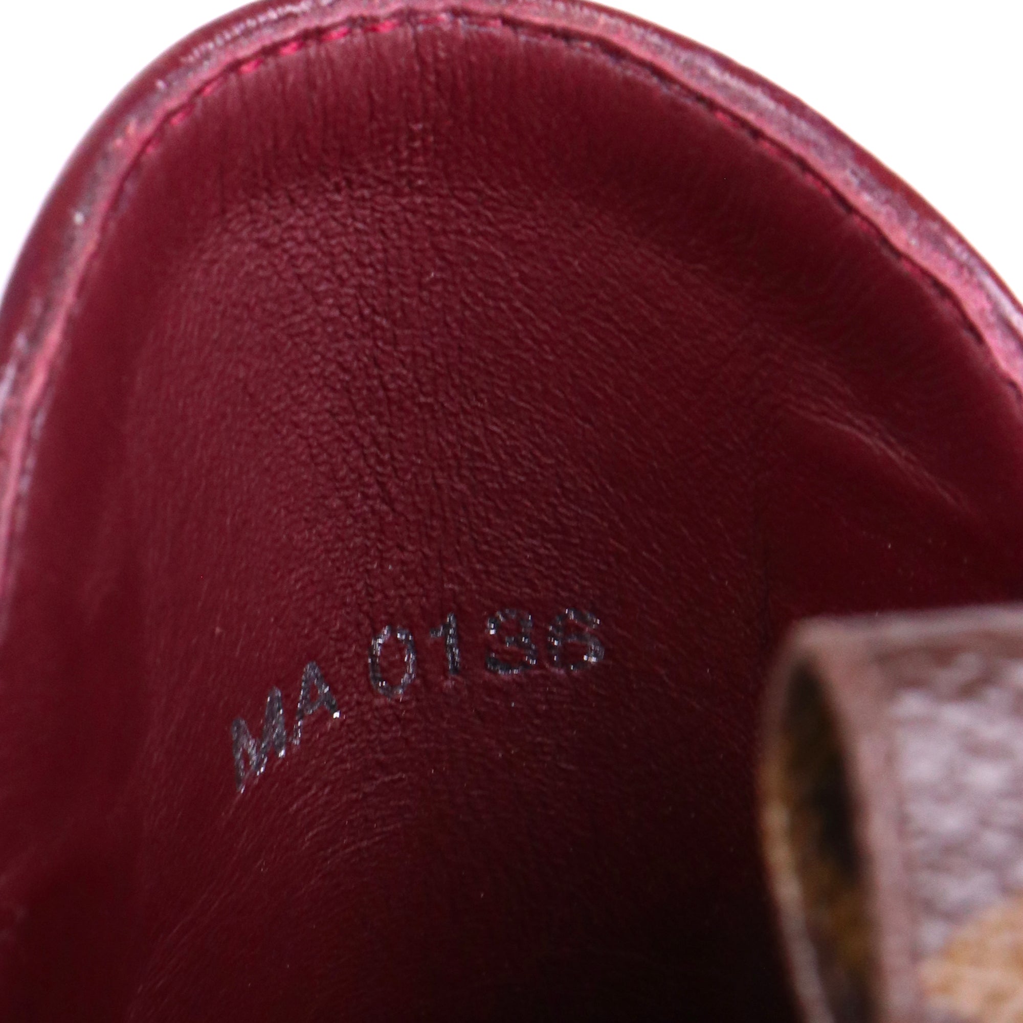 LOUIS VUITTON - Bottines Louis Vuitton en cuir bordeaux