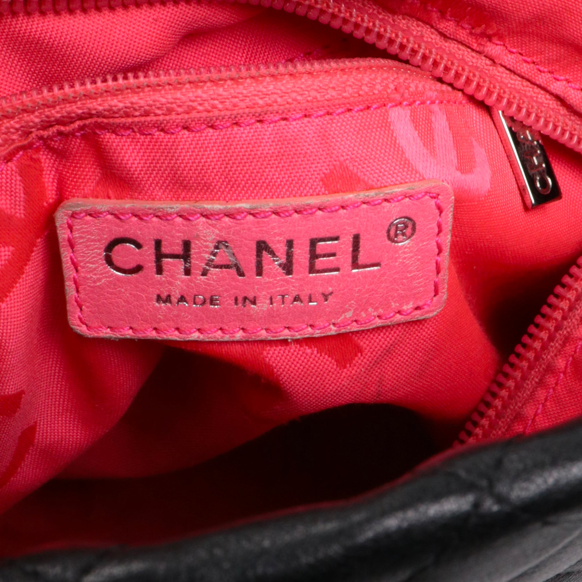 CHANEL - Cambon handbag in beige and black quilted leather
