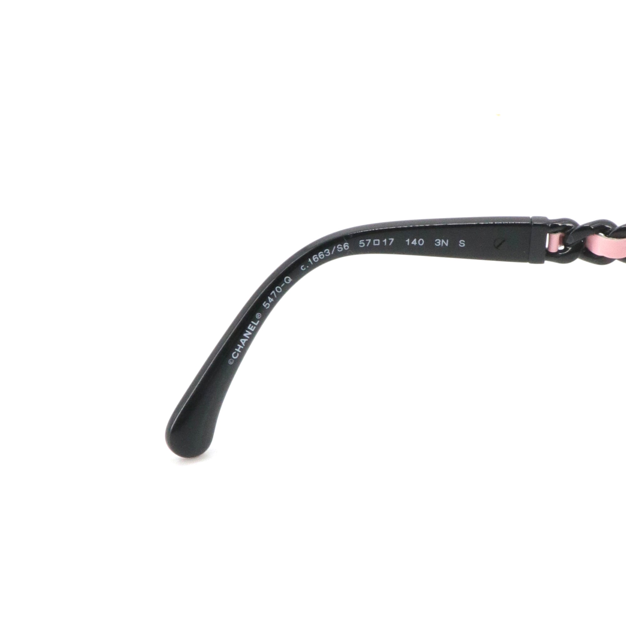 CHANEL - Lunettes de soleil Chanel en plastique noir