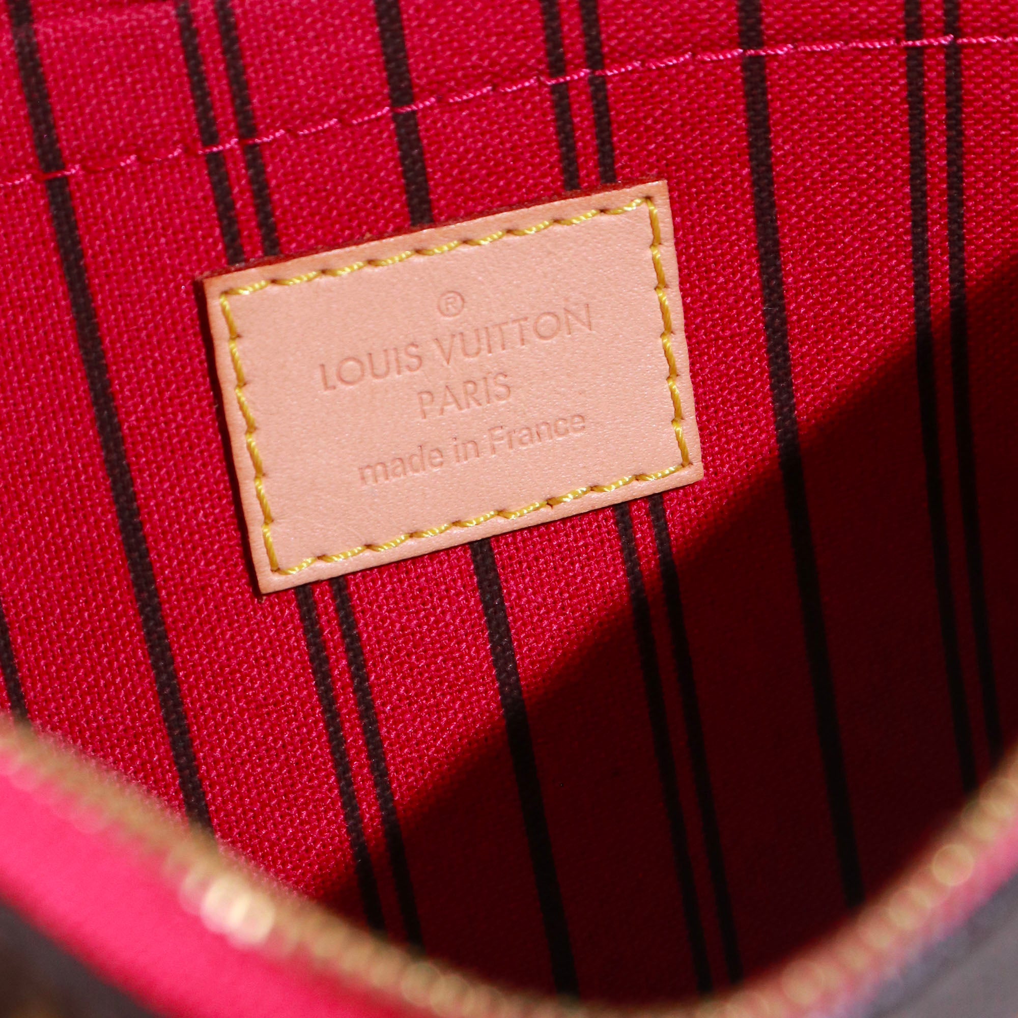 LOUIS VUITTON - Pochette Neverfull Louis Vuitton en toile monogrammée