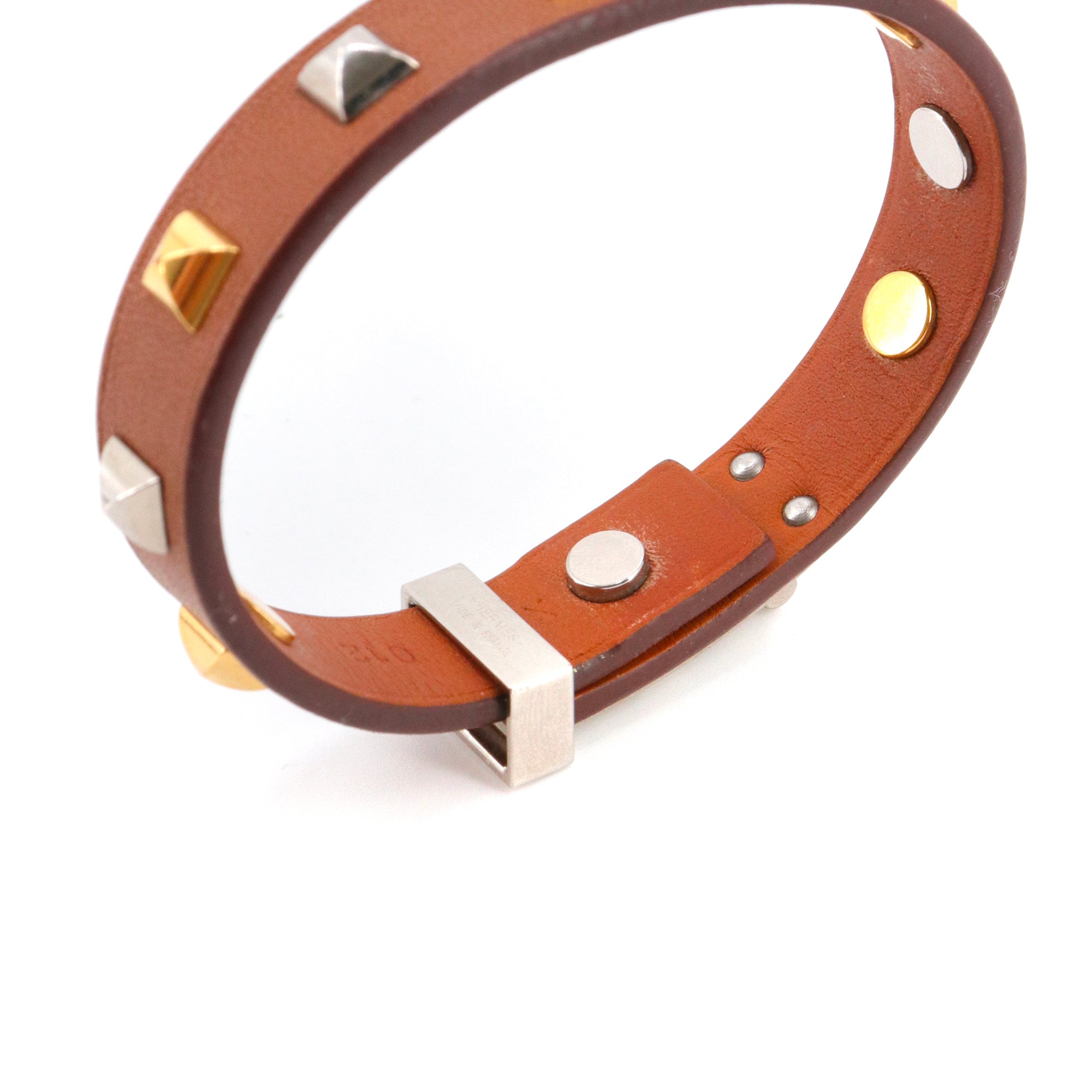 HERMÈS - Mini Dog Hermès bracelet in gold leather (T3)
