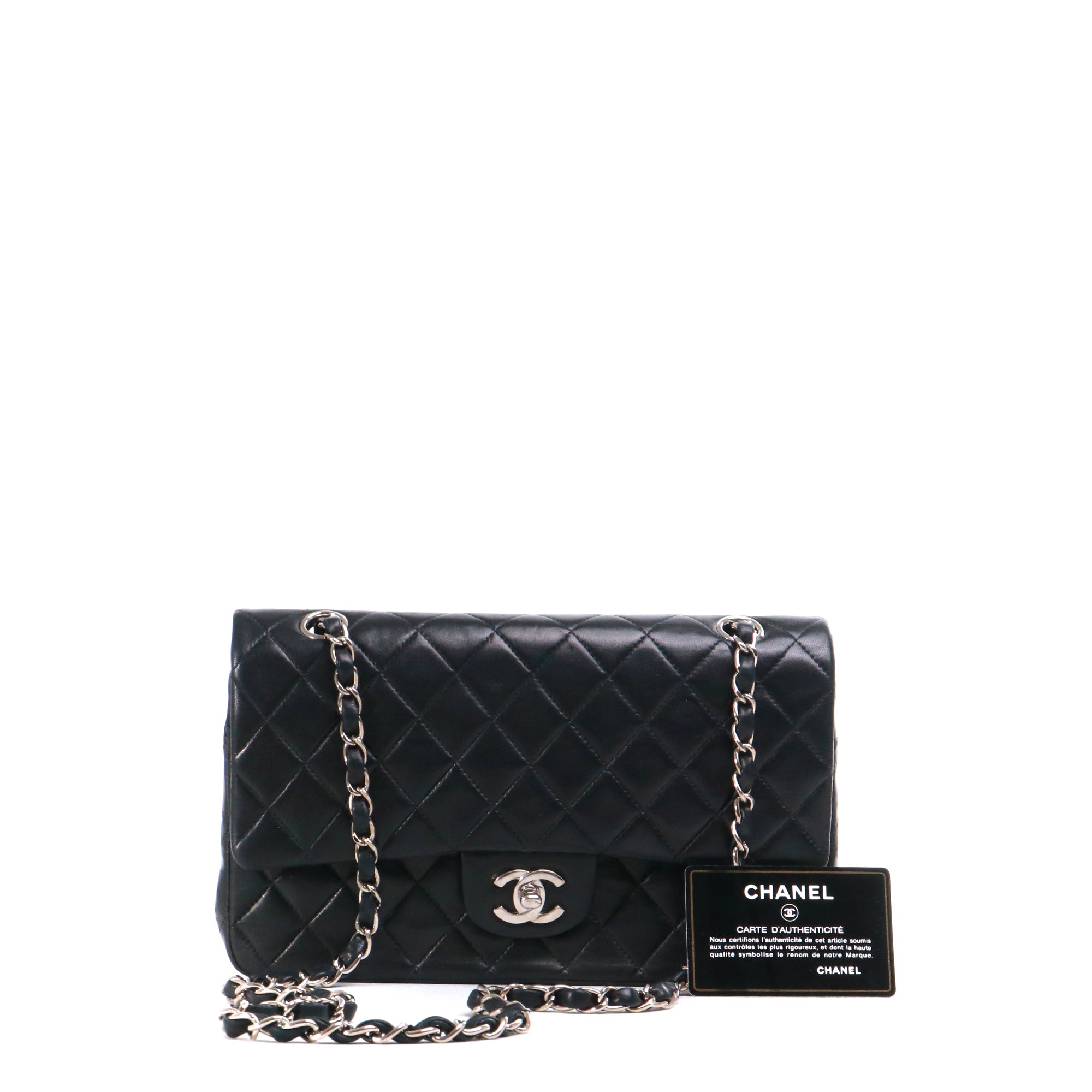 CHANEL - Sac à main Timeless 25 double flap Chanel en cuir matelassé noir