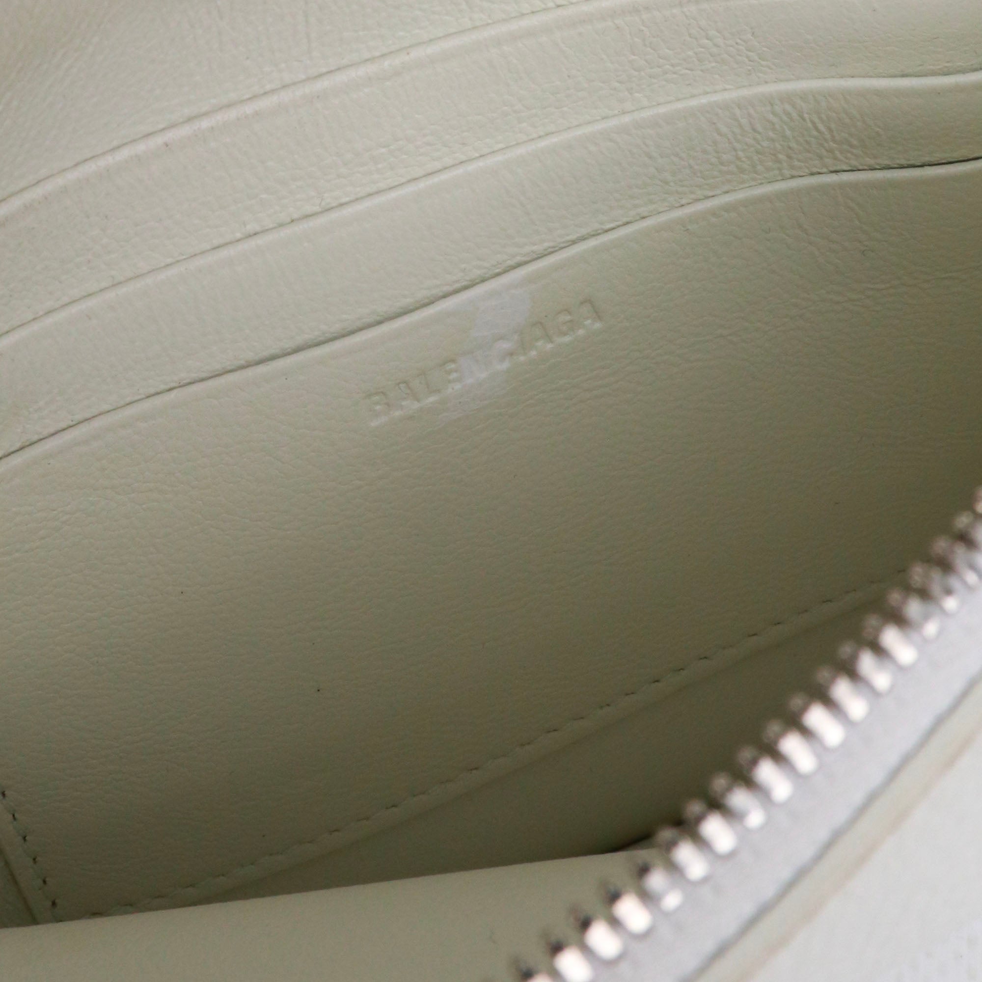BALENCIAGA - Balenciaga Ville wallet in white grained leather and wrist strap