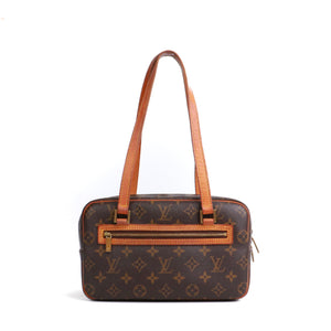 LOUIS VUITTON - Sac à main Cité Louis Vuitton en toile monogrammée vintage
