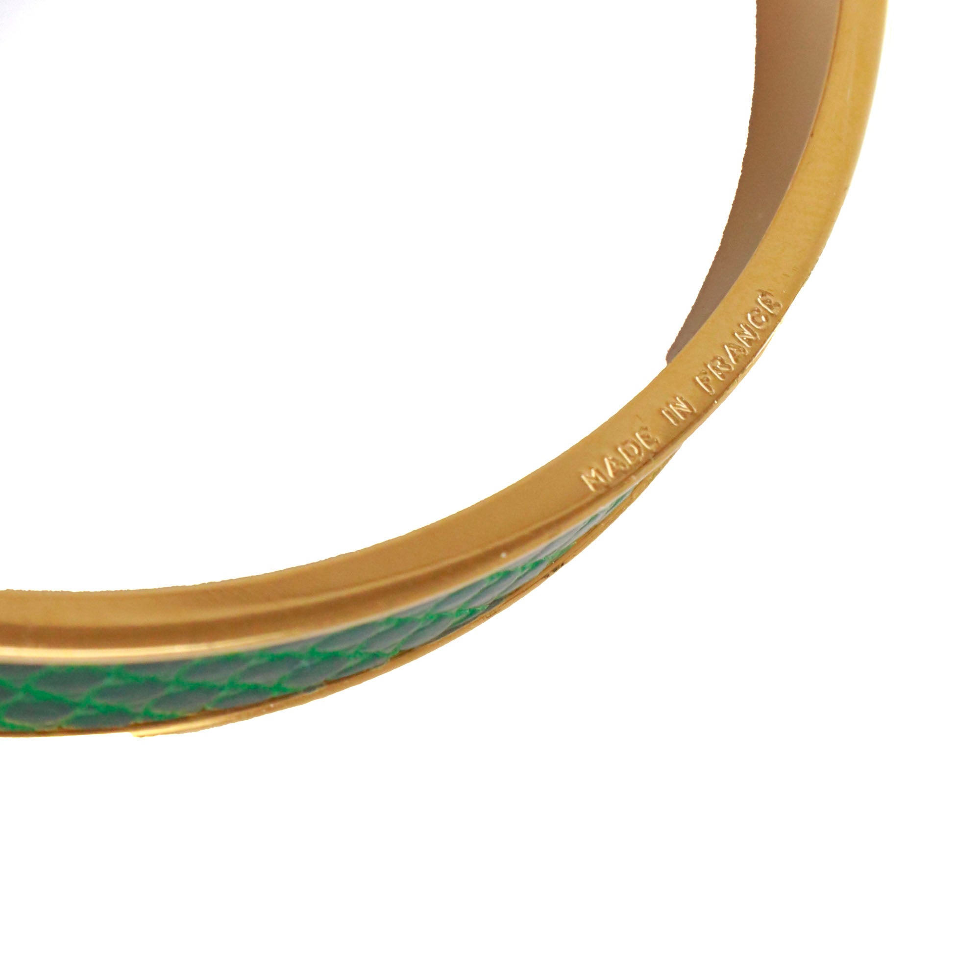 HERMÈS - Bracelet Kelly Cadenas Hermès en métal doré et cuir exotique vert